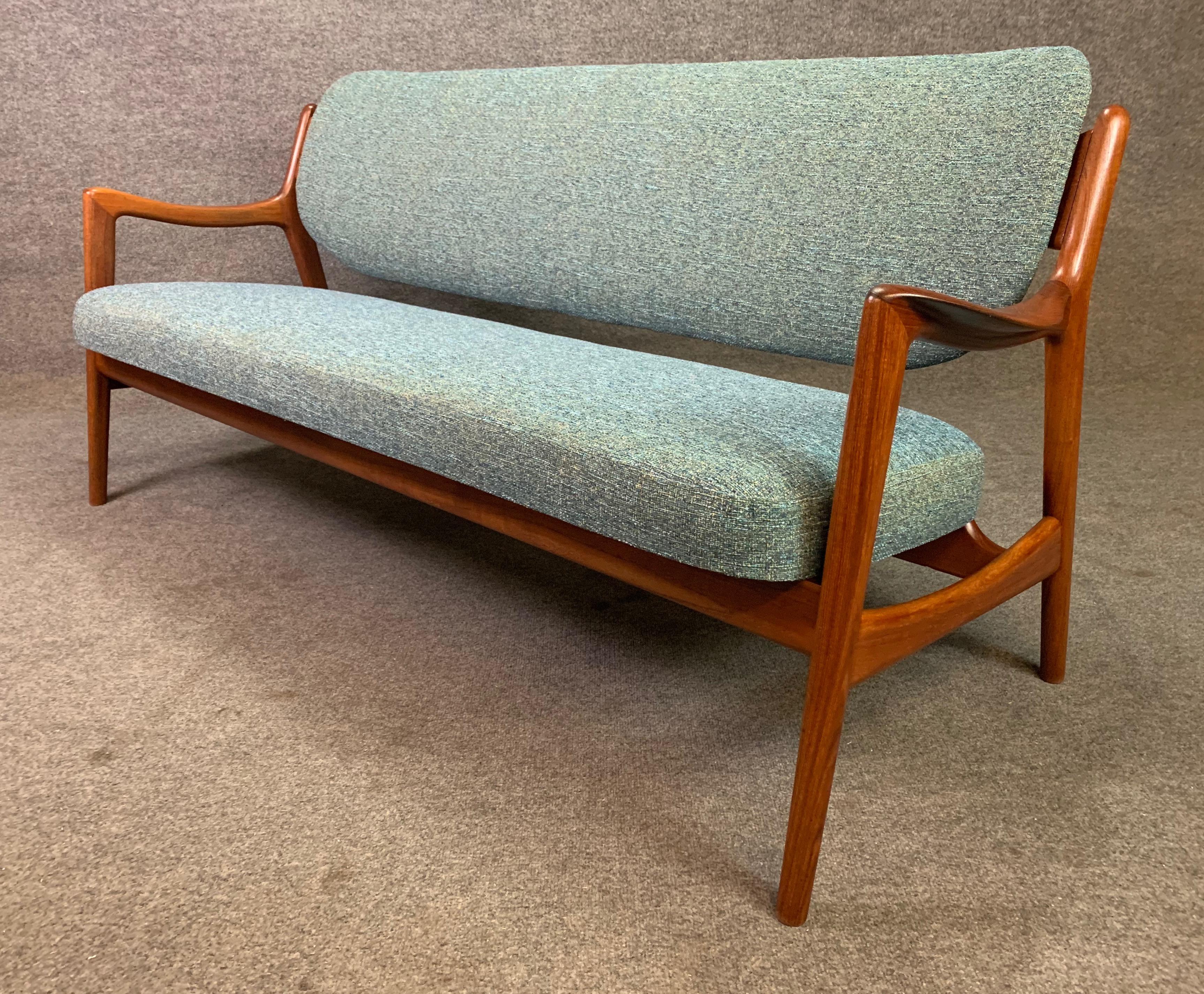 Here is a very rare Scandinavian Modern sofa in teak from the 