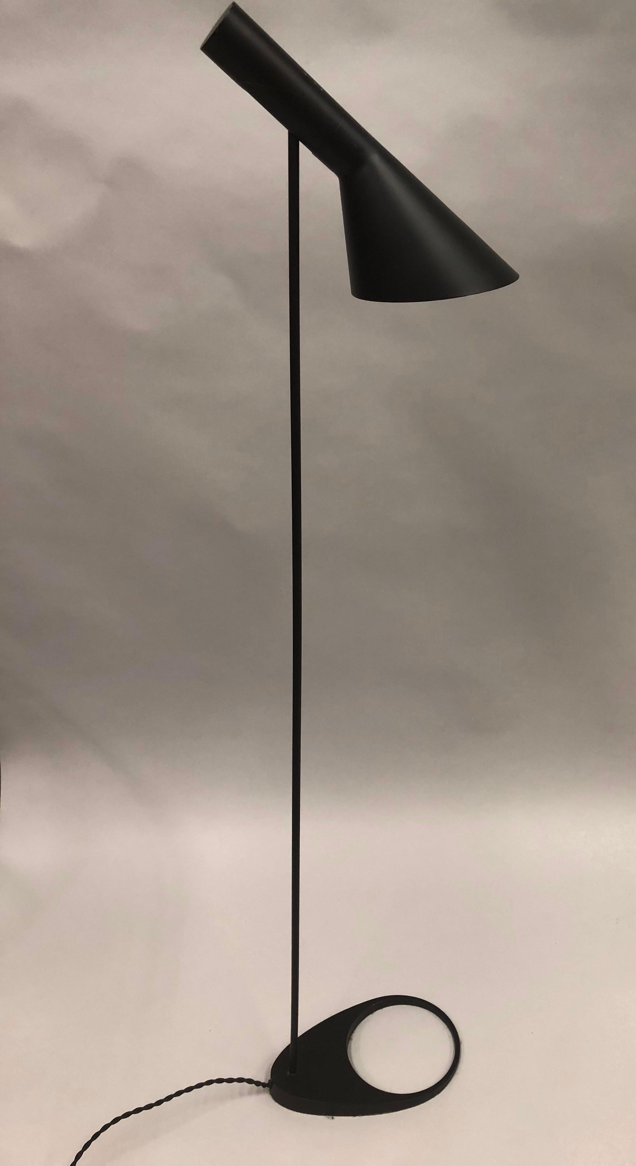 Vintage Scandinavian (Danish) Mid-Century Modern floor lamp by Arne Jacobsen for Louis Poulsen. This piece was originally designed by Jacobsen for the SAS Royal Hotel in Copenhagen circa 1970 and has become a classic of modern design.

The piece