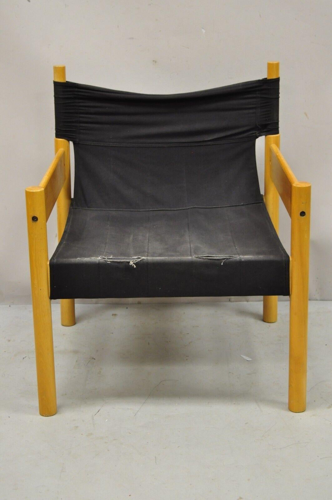 Vintage Scandinavian Modern birch wood lounge chair with black canvas seat. Item features a canvas seat, solid birch wood frame, clean modernist lines, great style and form. Circa mid to late 20th century. Measurements: 29