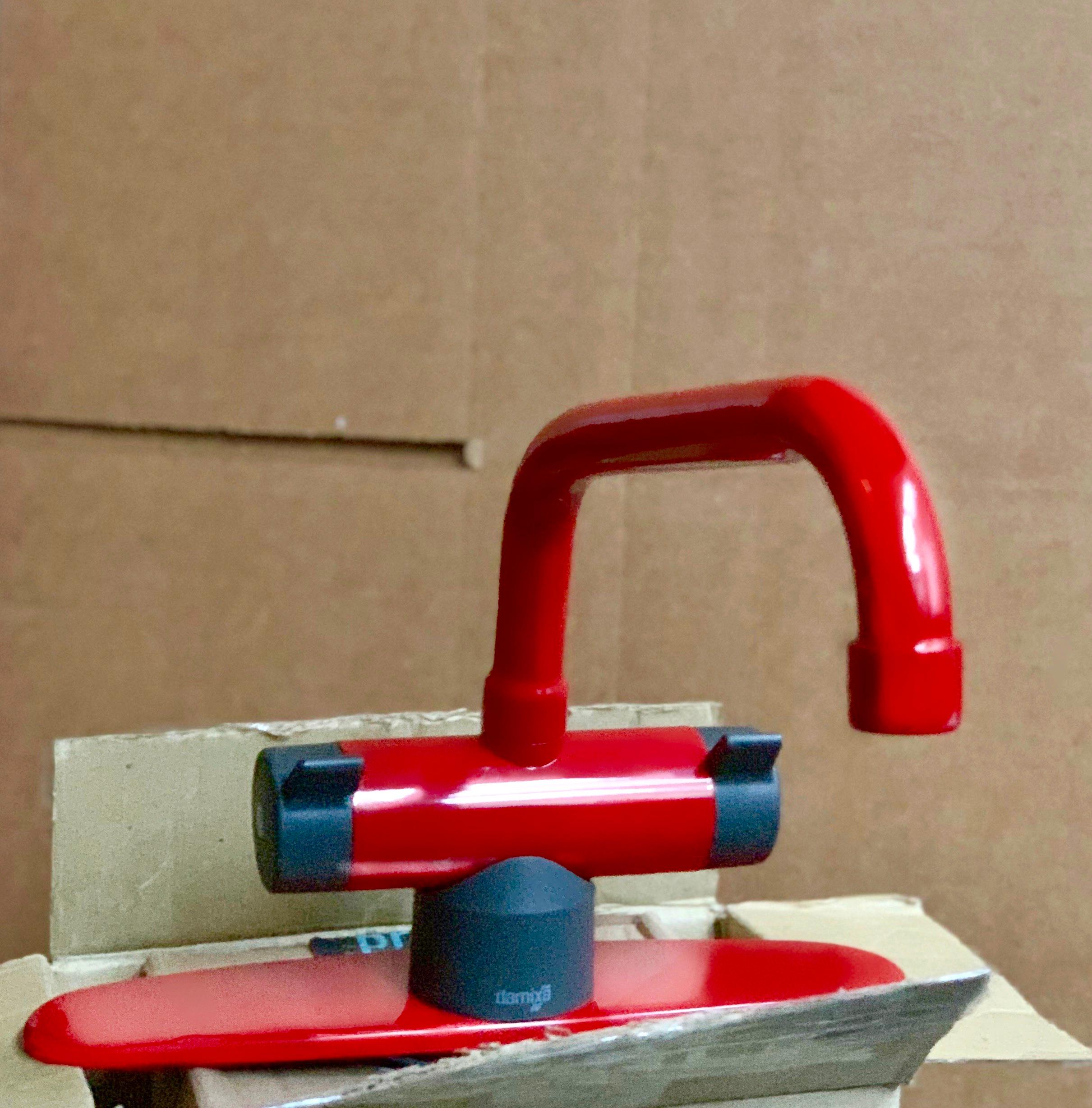 Vintage Scandinavian Modern Damixa faucet fitting, cherry red, Denmark, 1983. Damixa invented the single-handled faucet in 1966 and began using the iconic red / blue button in 1983. Extremely rare vintage piece in custom cherry red with gray