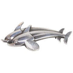 Vintage Scandinavian modern Georg Jensen Silver brooch of Double Dolphin 1960s