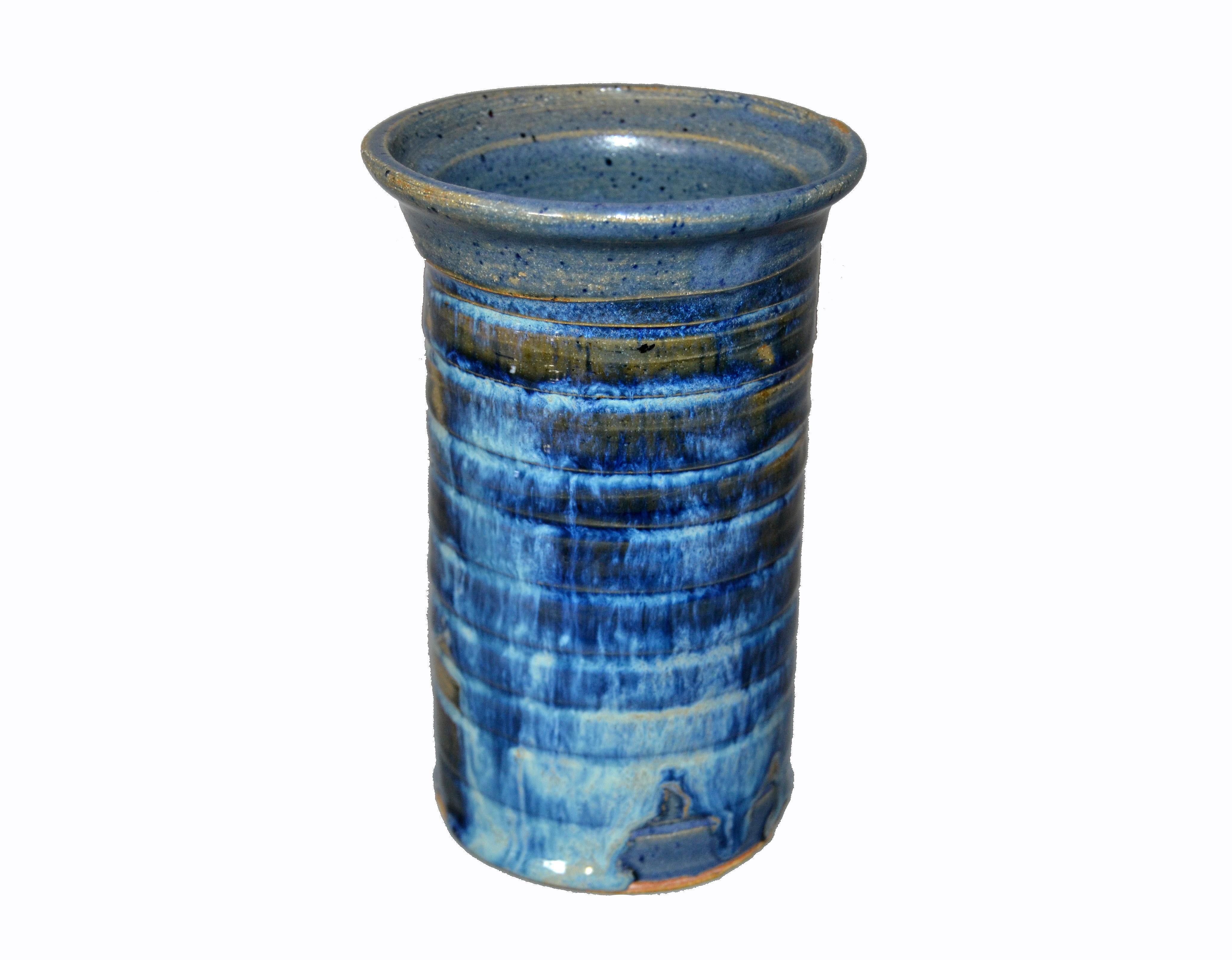 Vintage Scandinavian Modern handcrafted glazed blue and brown art pottery, ceramic decorative vase.
Unidentified Scandinavian ceramist: M, numbered 07 A.
 