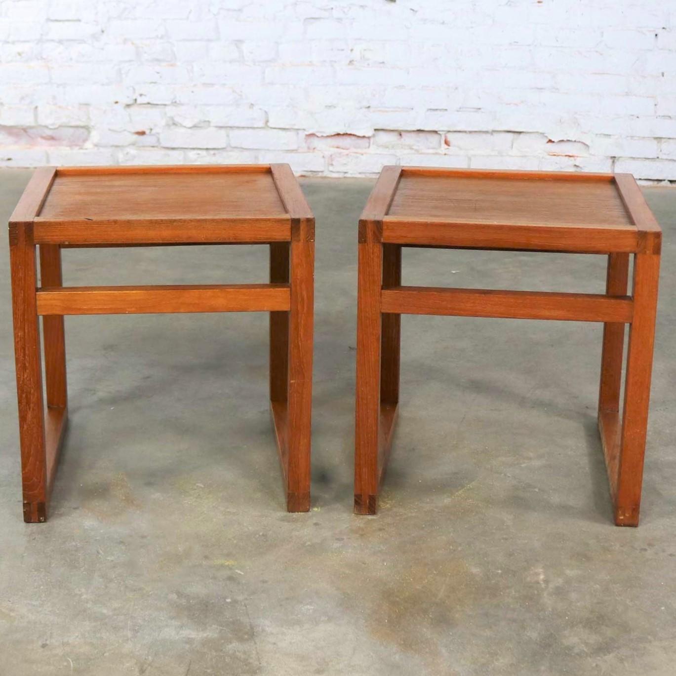 Handsome pair of Scandinavian Modern square side tables in teak with an open cube styling. They are in wonderful vintage condition with no outstanding flaws. Please see photos. Price is for the pair, circa 1960s.

Sometimes you just need little