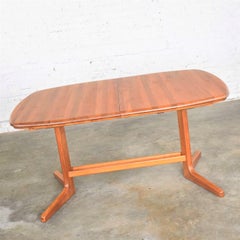 Scandinavian Modern Teak Oval Expanding Dining Table Attributed to Dyrlund