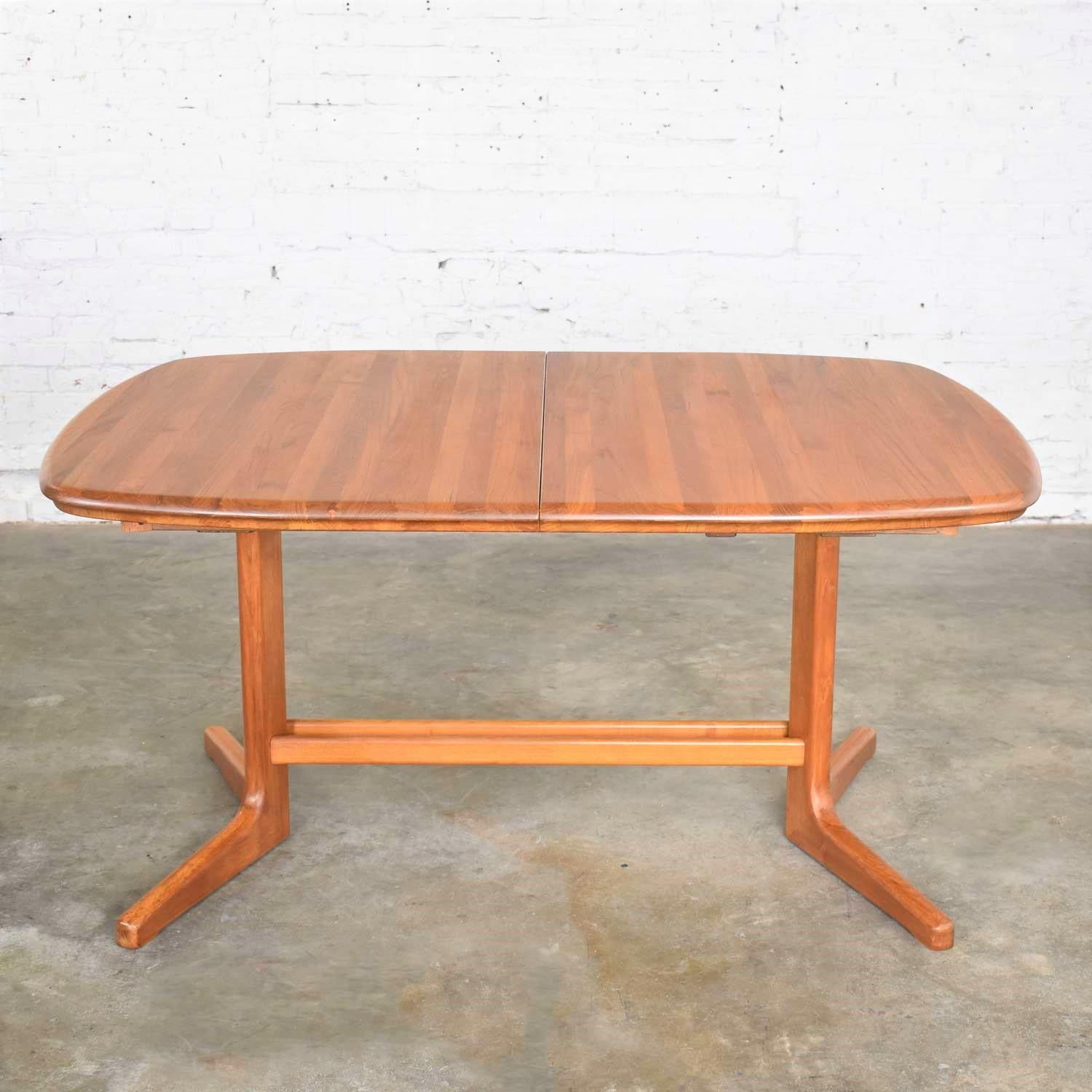 Danish Scandinavian Modern Teak Oval Expanding Dining Table Attributed to Dyrlund