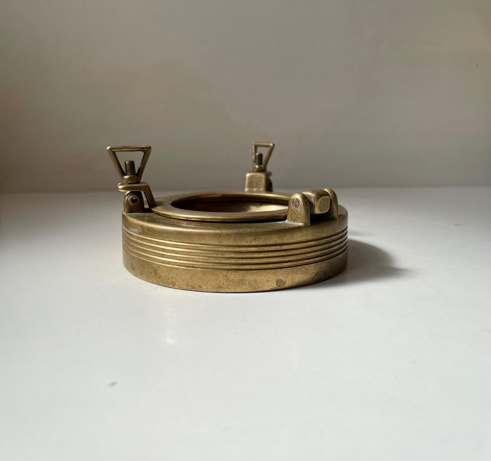 antique brass porthole
