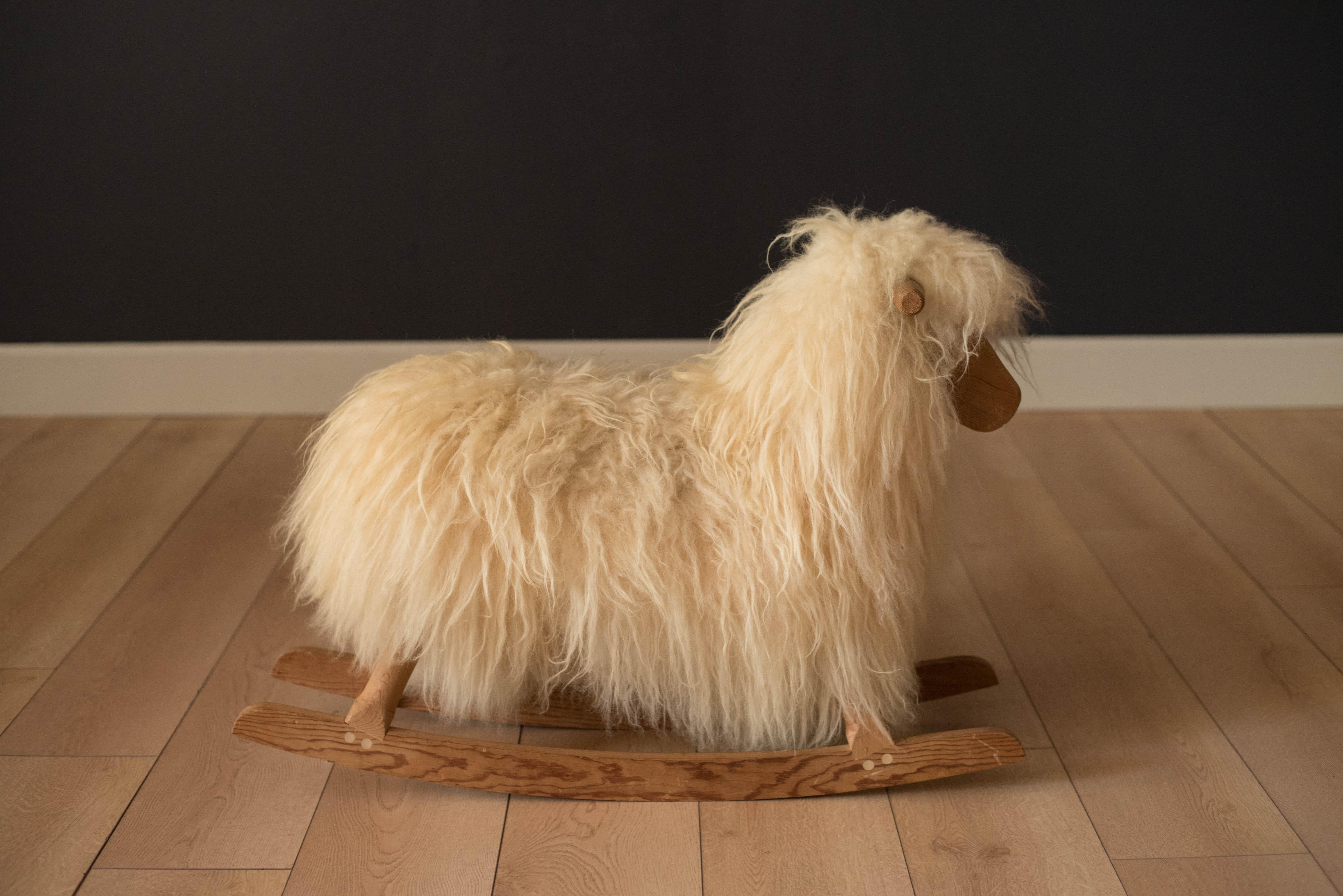 Vintage children's rocker sheep designed by Povl Kjer. This decorative animal sculpture is a playful conversation for any space. Handcrafted in genuine wool and solid pine.
      