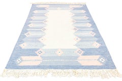 Scandinavian Rug Rollakan Soft Muted Color Palette