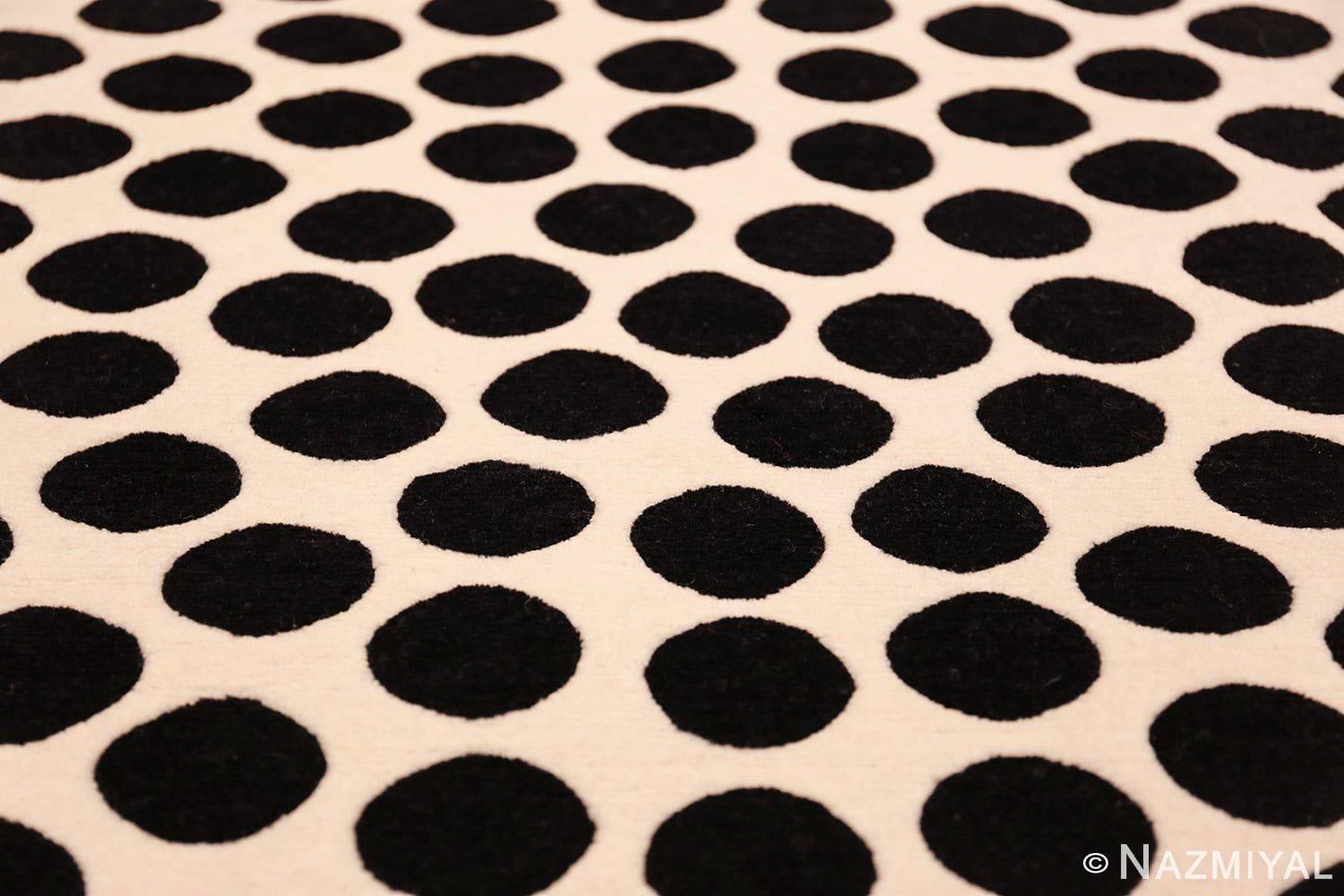 Beautiful and highly artistic vintage Scandinavian round Verner Panton black and white polka dot rug, country of origin / rug type: Scandinavia rug, date: circa mid-20th century. This iconic artist Verner Panton brought his unique sense of color,