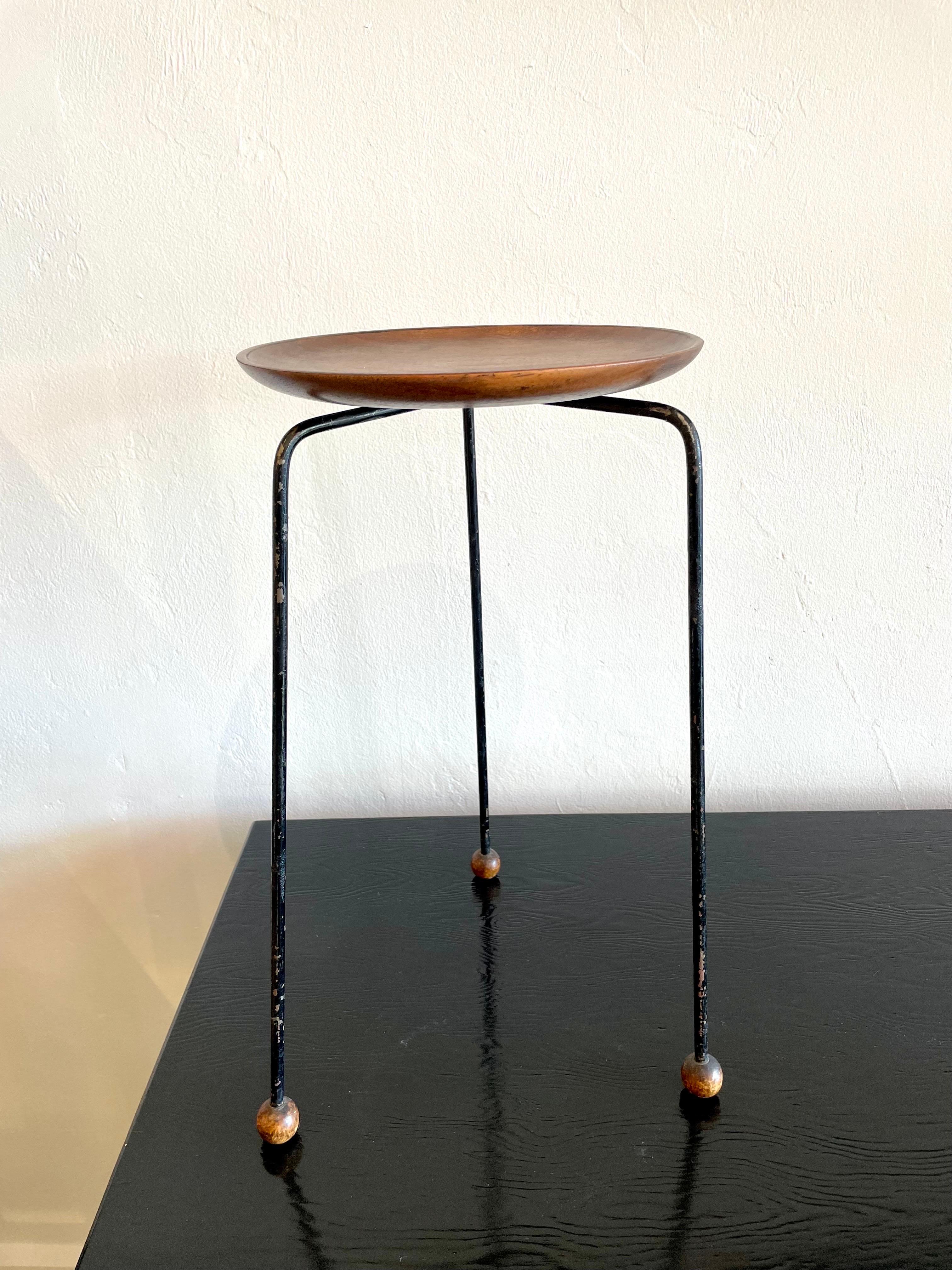 This lovely little teak plate top side table with matching wood ball feet/sabots is in ALL original condition with normal wear to metal legs (scuffs and such).  It is lightweight but VERY sturdy.  A wonderful and masterful Scandinavian design.