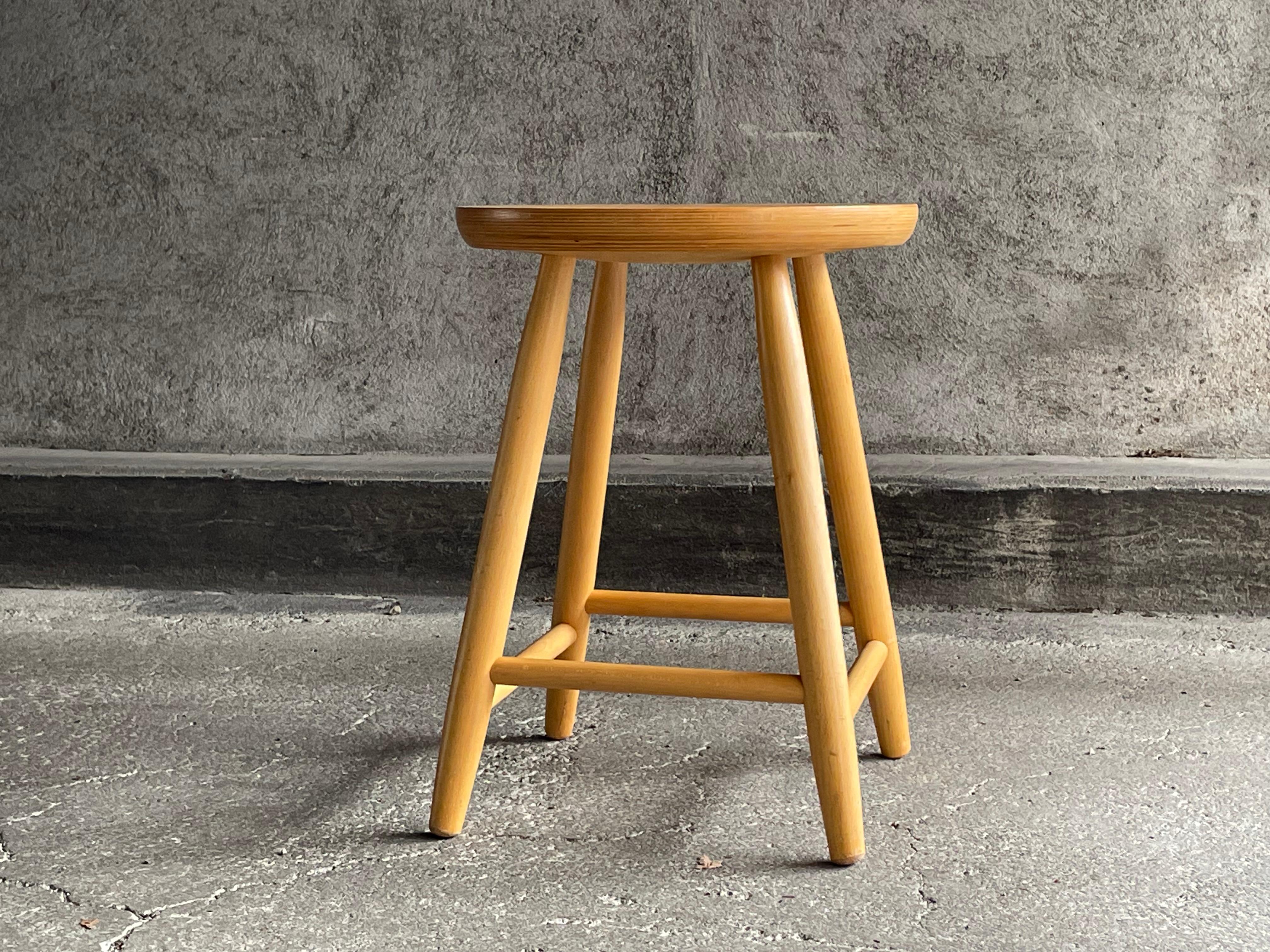 Scandinavian vintage stool in light beech. Traces of use on the seat. The stool is perfectly stable and solid. Dimensions: diameter 34 cm. Height 45 cm