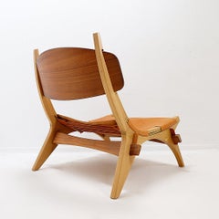 Vintage Scandinavian style lounge chair in wood and leather