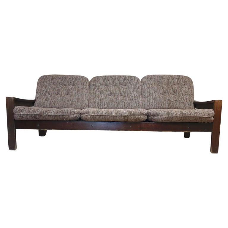 This lounge Scandinavian style three seater sofa was made in the 1980´.  The mattresses are upholstered with fabric. The structure is made of beech wood. All in good Vintage condition, minor signs of age and use. Two pieces available.

Dimensions of