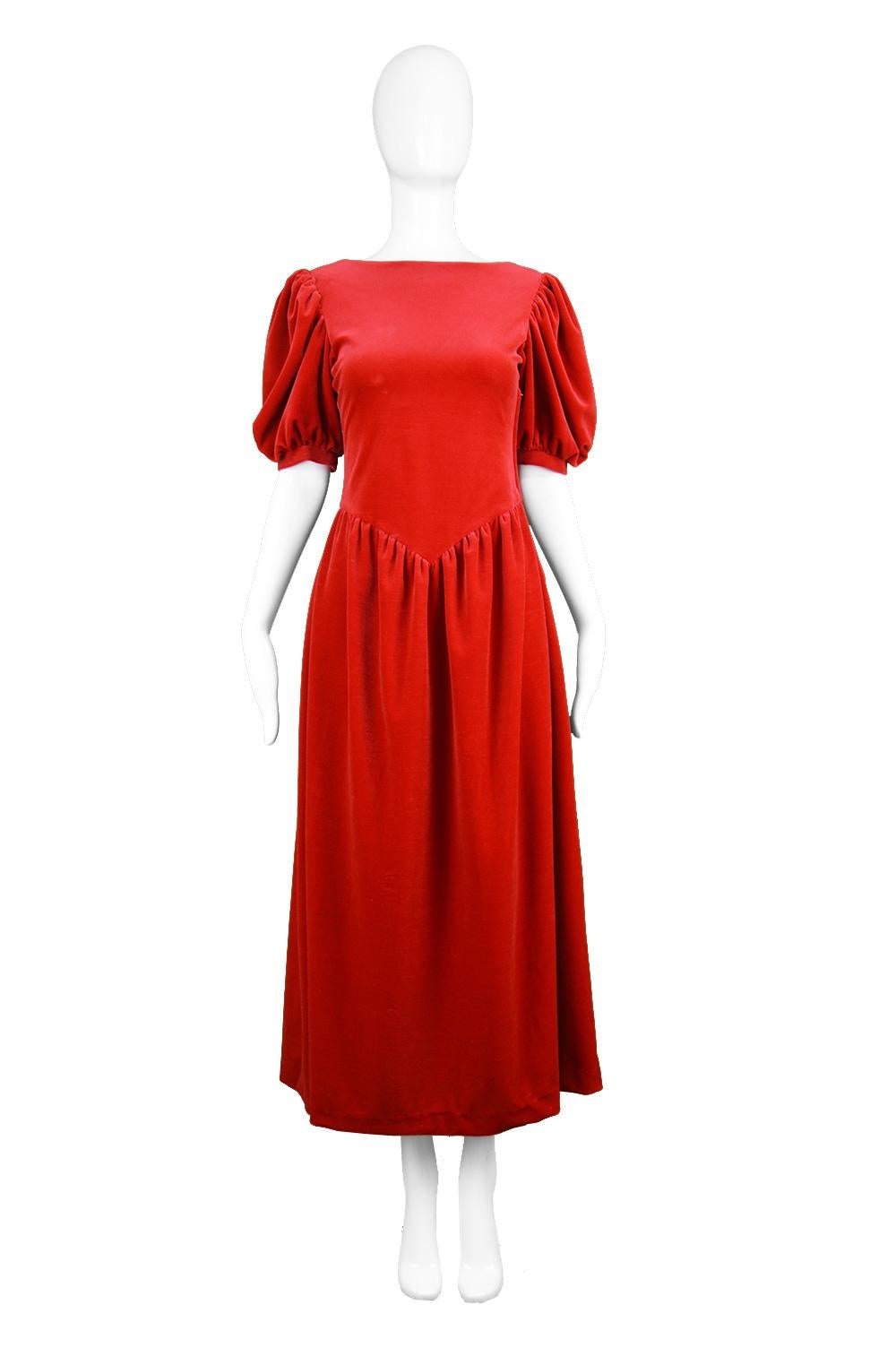 Vintage Scarlet Velvet Velour Deep Back Puff Sleeve Evening Dress, 1970s

Estimated Size: UK 8/ US 4/ EU 36. Please check measurements. 
Bust - Stretches from 32”-34