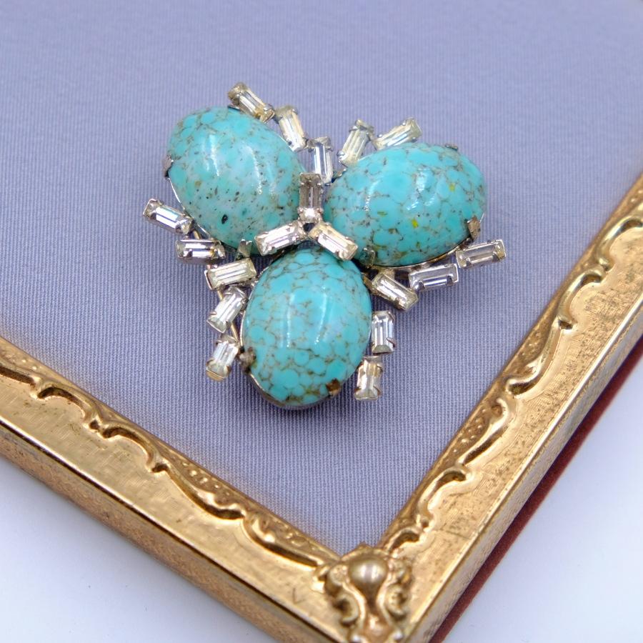 Year: 1950
Hallmark: Schreiner

Materials: base metal, rhinestones, faux turquoise