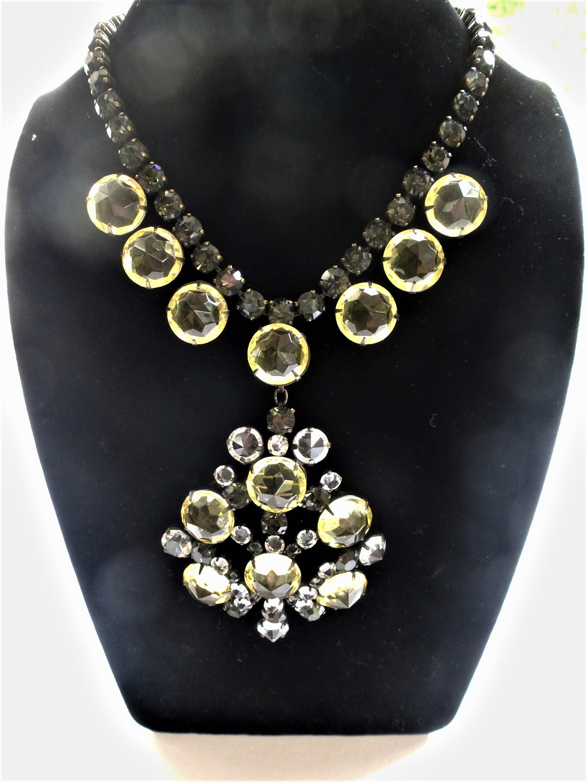 Important and impressive Schreiner NY pendant necklace with big yellow and clear cut stones. Transformable necklace detachable pendant wich becomes a large brooch. Crafted in gunmetal and set with exceptional array of crystals as is the hallmark of