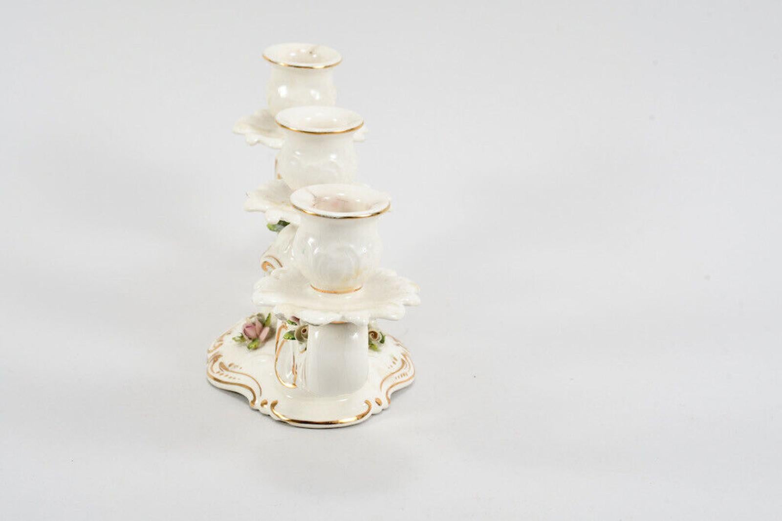 This vintage set includes 2 exquisite bowls and 1 stunning chandelier, all made from fine Schumann Arzberg porcelain. The bowls feature a timeless design with delicate floral patterns, and the chandelier boasts a captivating crystal and metal
