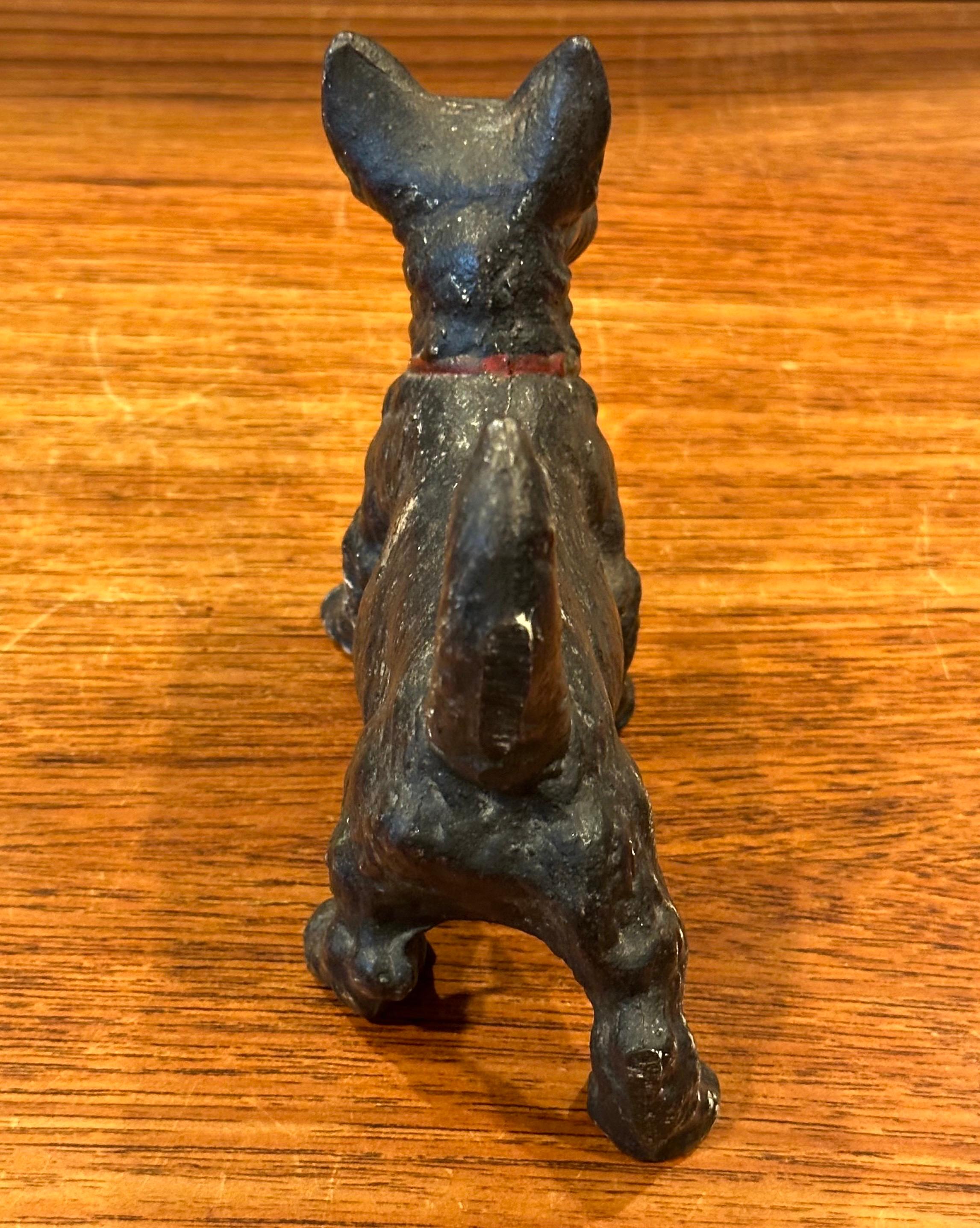 Vintage Scottie Dog Cast Iron Door Stop / Sculpture In Good Condition For Sale In San Diego, CA