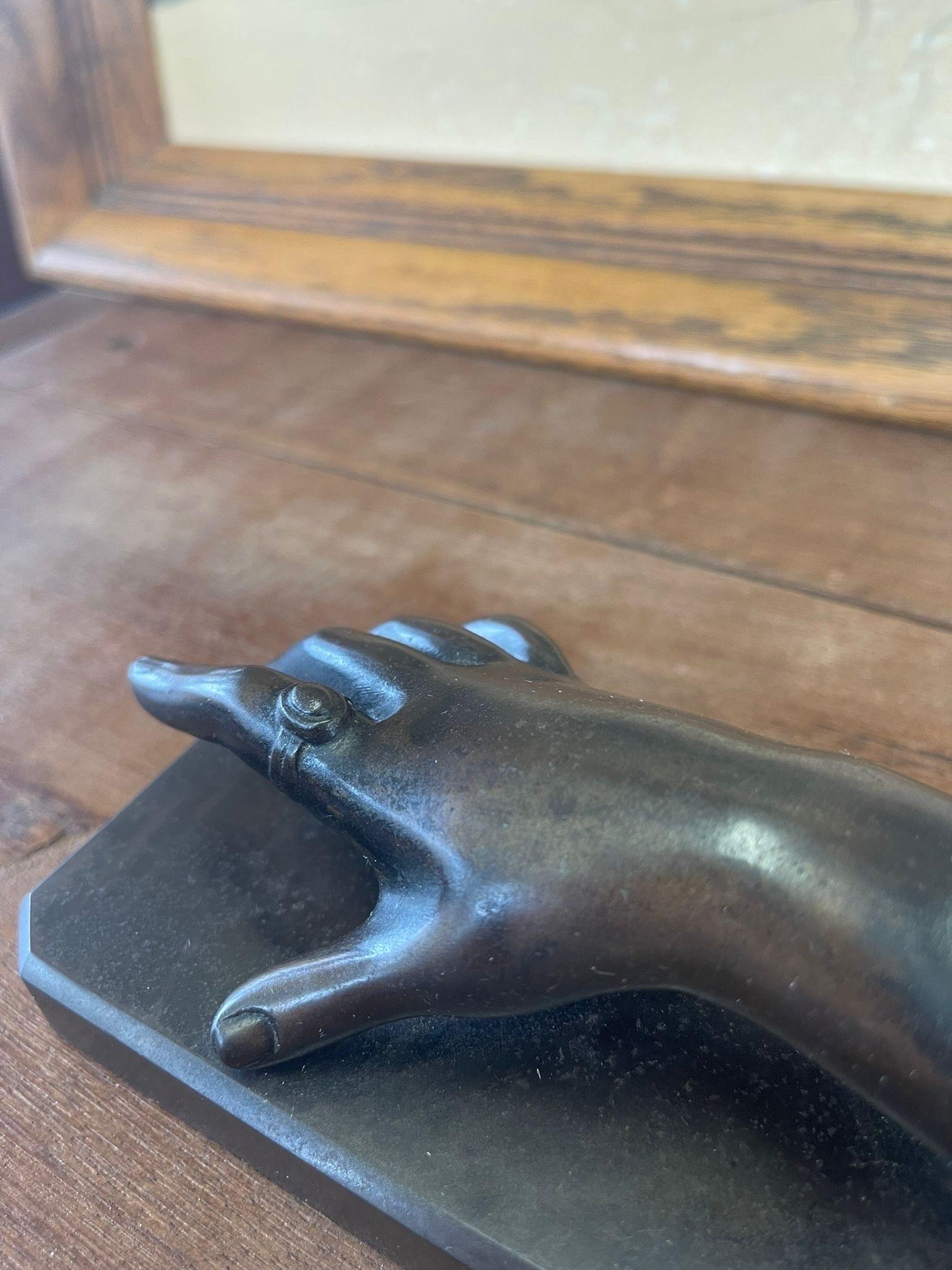Vintage Sculpted Bronze Hand Figurine Atop Bronze Base In Good Condition For Sale In Seattle, WA
