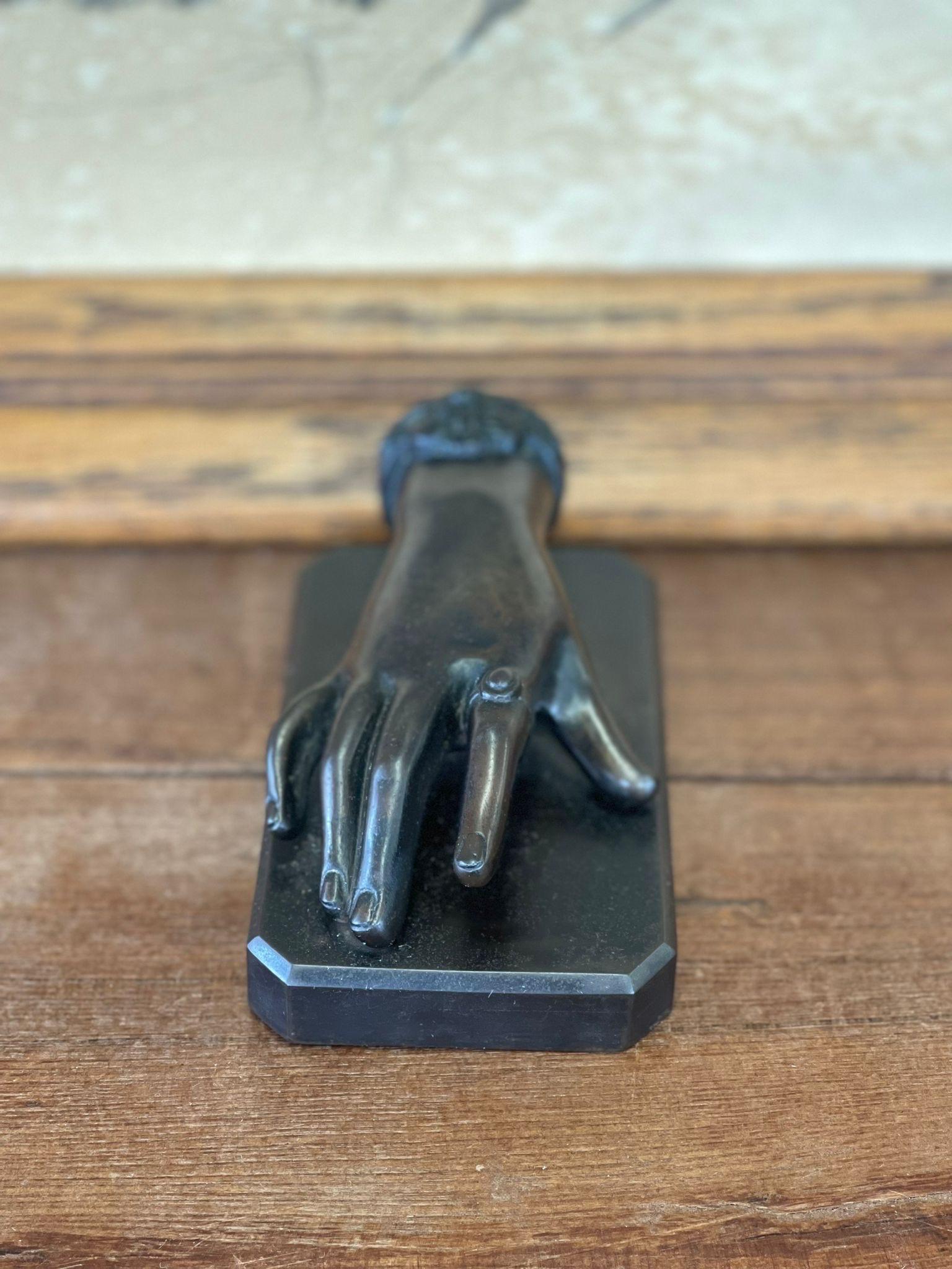 Late 20th Century Vintage Sculpted Bronze Hand Figurine Atop Bronze Base For Sale