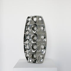 Vintage sculptural & Rare Ceramic Vase in Chrome Finish , with holes 1970's