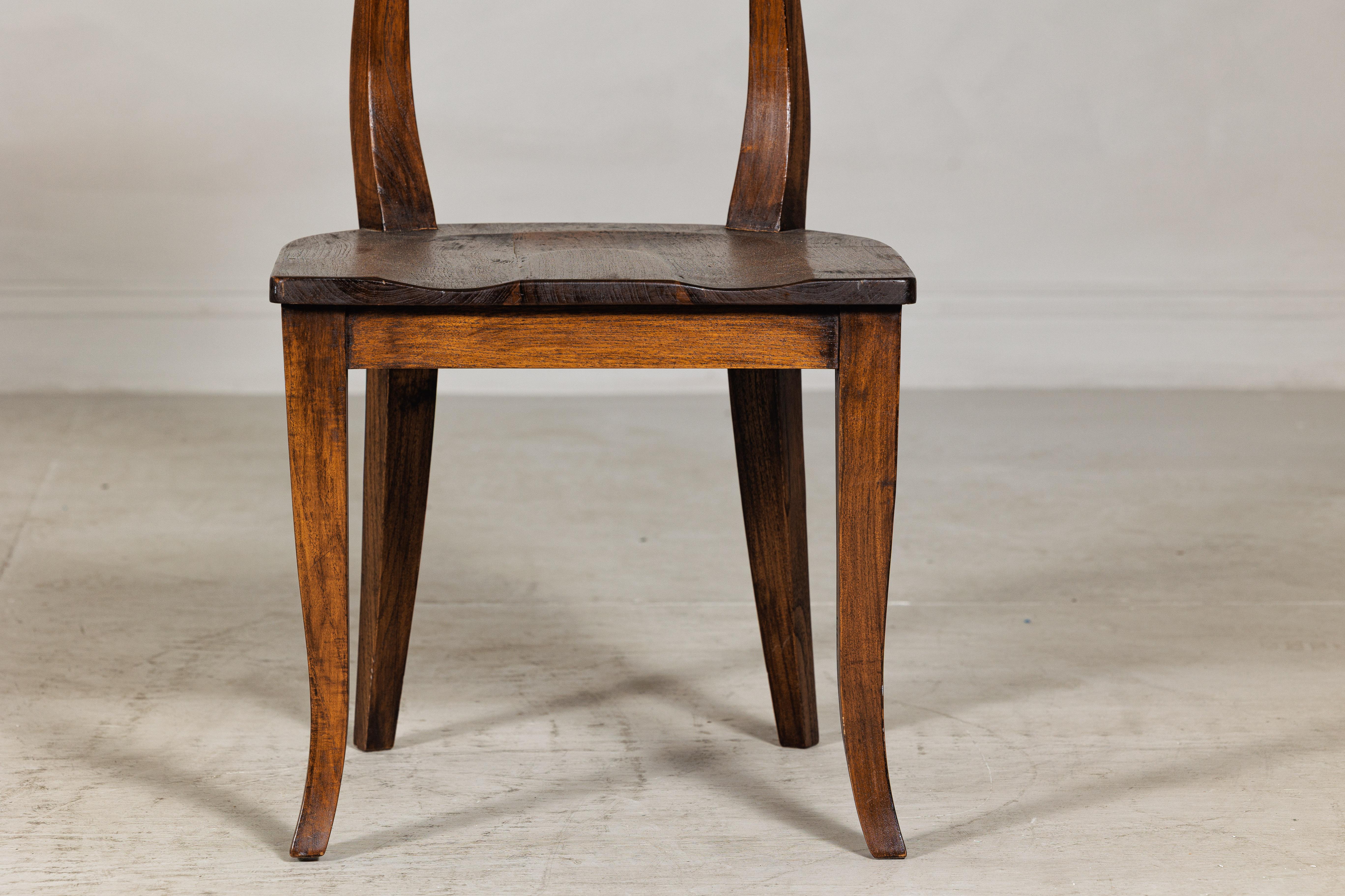 Javanese Vintage Sculptural Teak Wood Side Chair with Pierced Back Detail For Sale