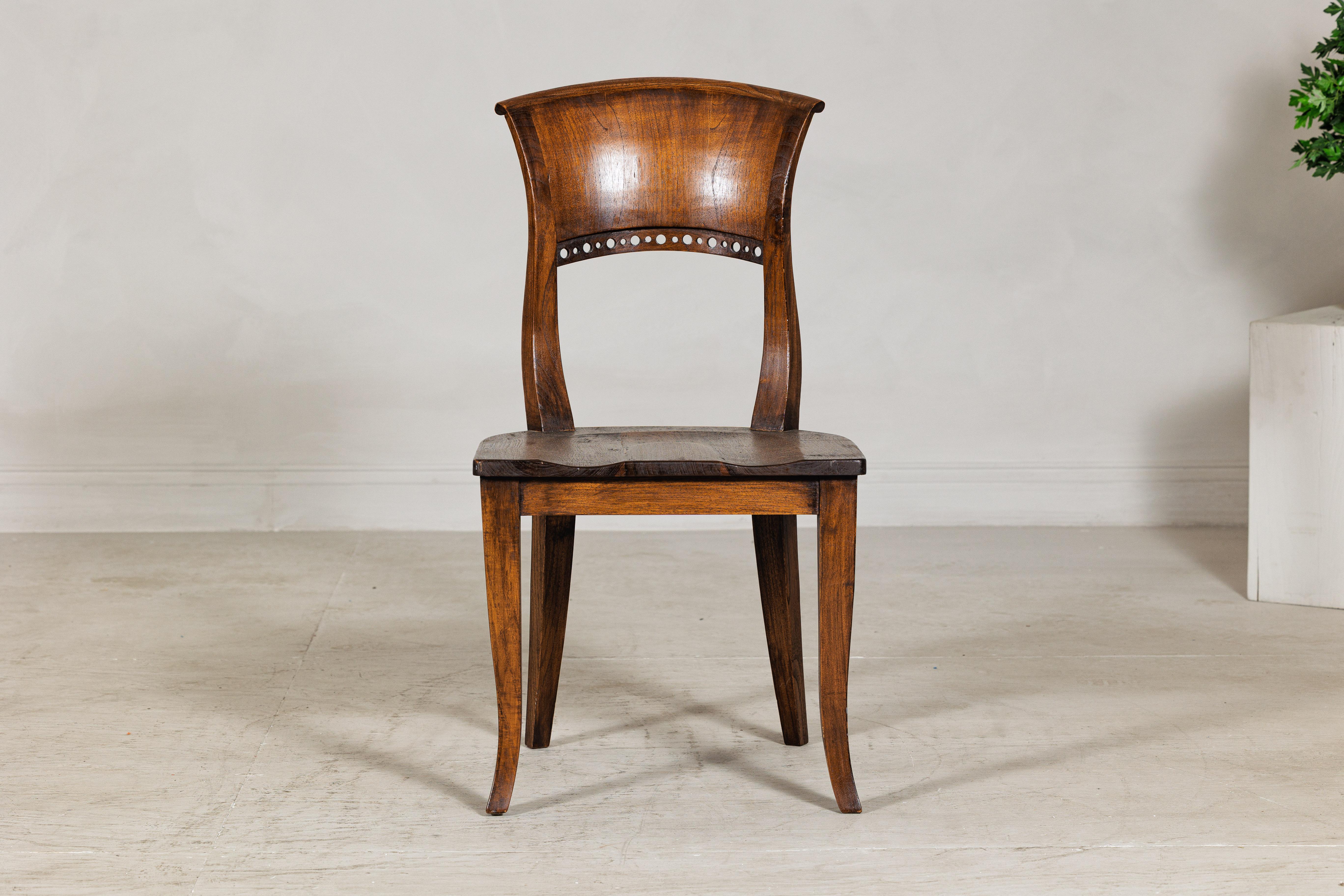 Carved Vintage Sculptural Teak Wood Side Chair with Pierced Back Detail For Sale