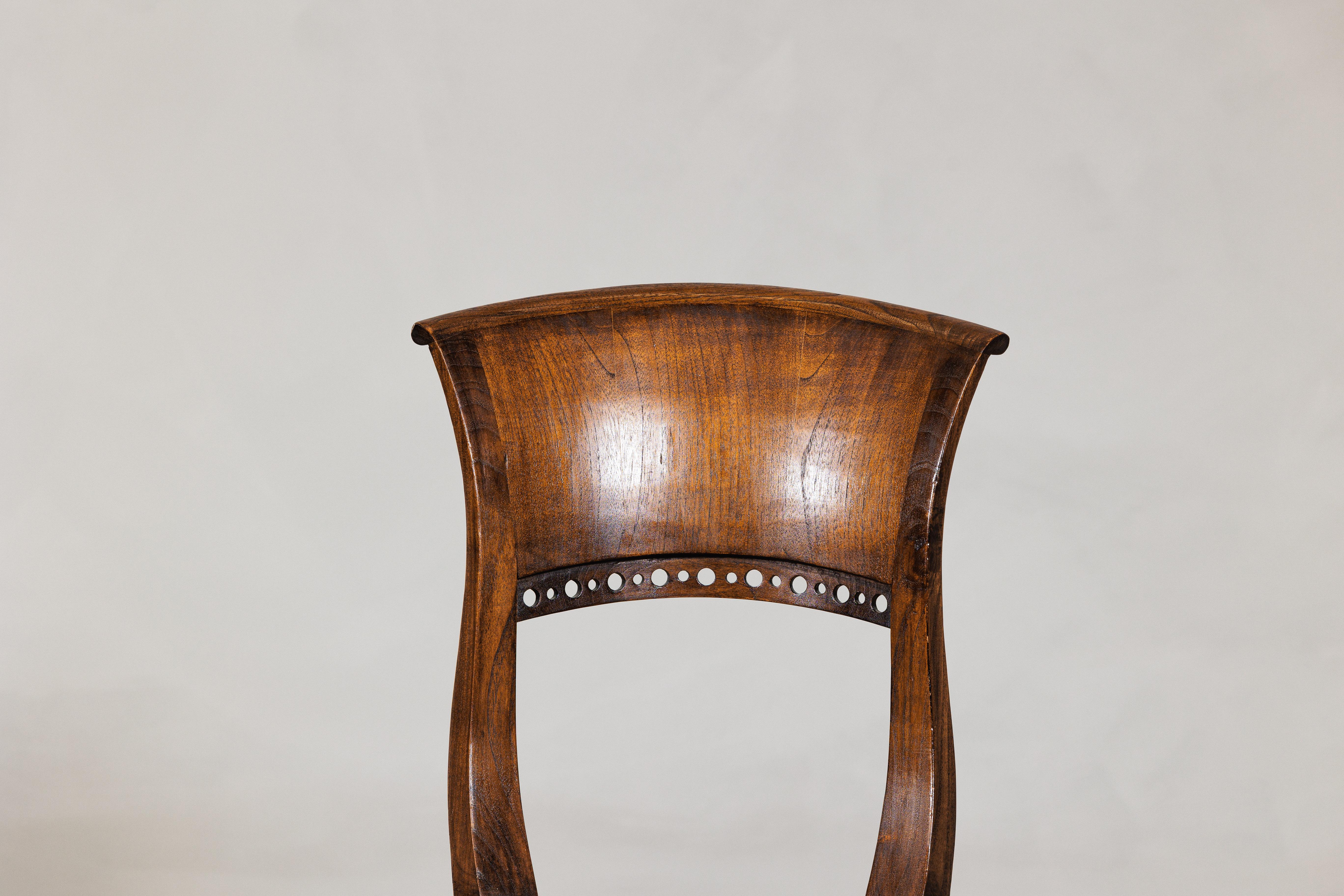 20th Century Vintage Sculptural Teak Wood Side Chair with Pierced Back Detail For Sale