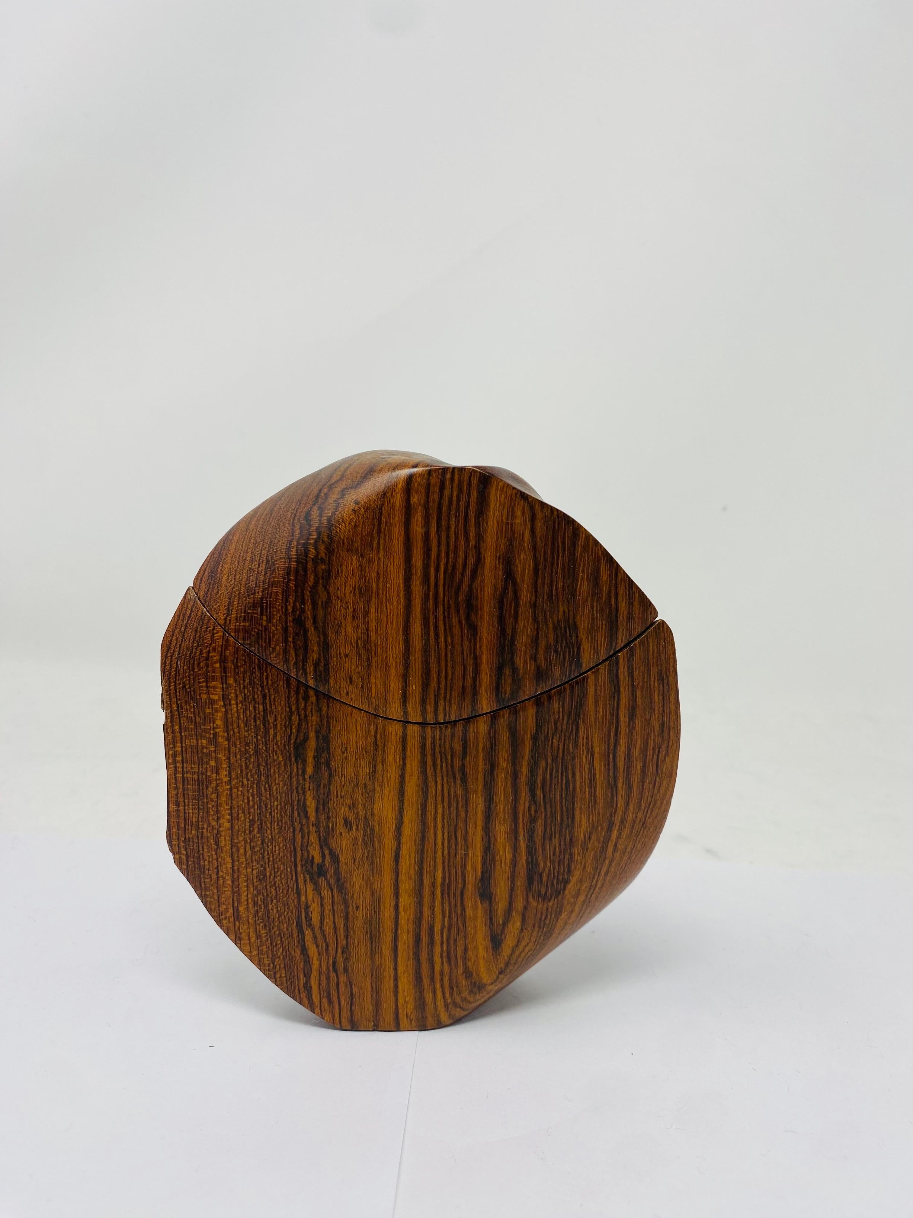 Rare, unique and exceptional perfume atomizer. This beautiful and sculptural atomizer is representative of its period. Clean lined and modernist in presence, this piece is a functional piece that marvels the eye with its functionality and beauty.