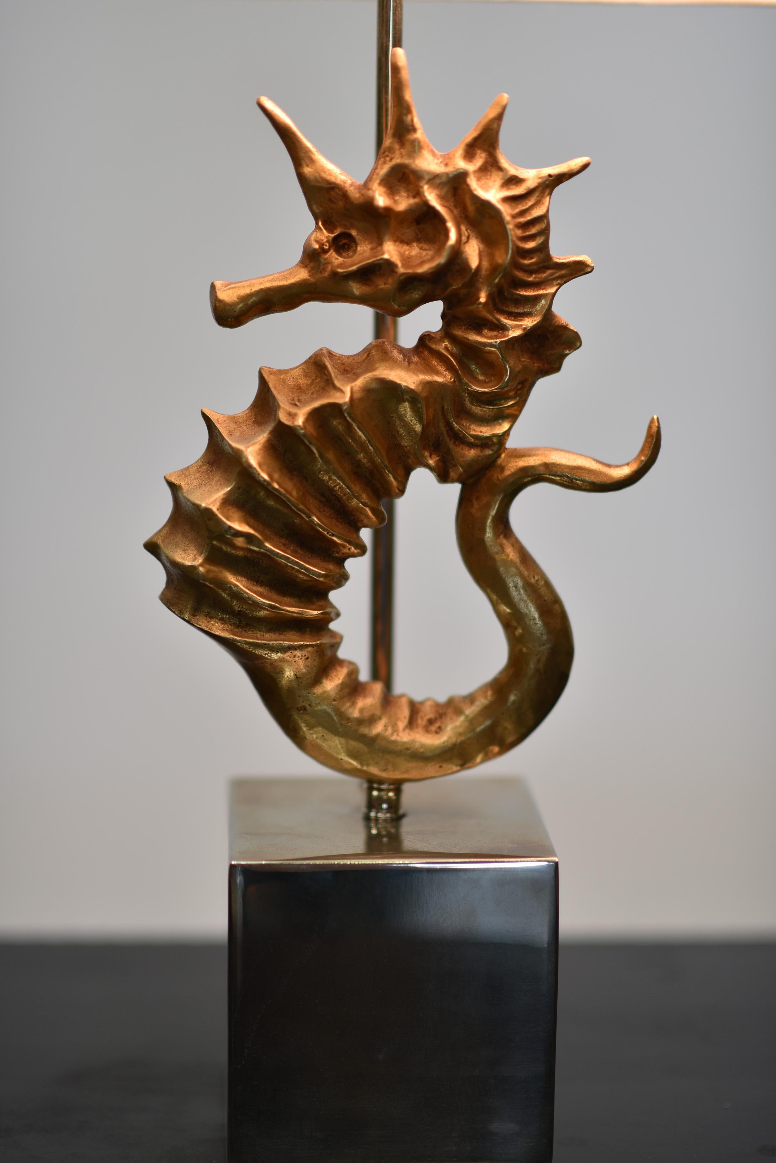 Seahorse sculpted lamp cast in gilt metal against a chrome rod, circa 1950s. Unknown artist or designer.