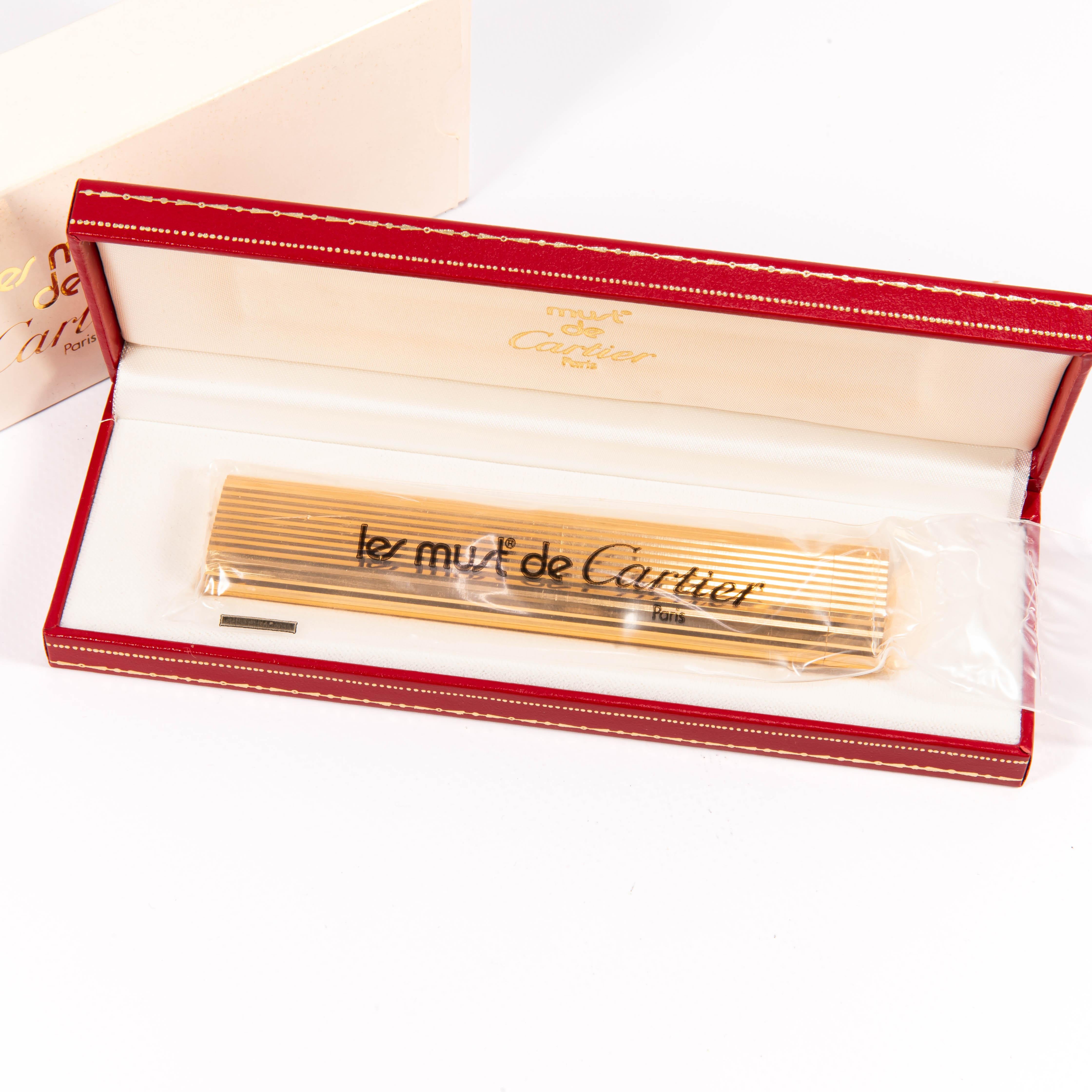Vintage SEALED New Old Stock CARTIER Les Must Desk Lighter Gold Plated in Box In New Condition For Sale In DELFT, NL