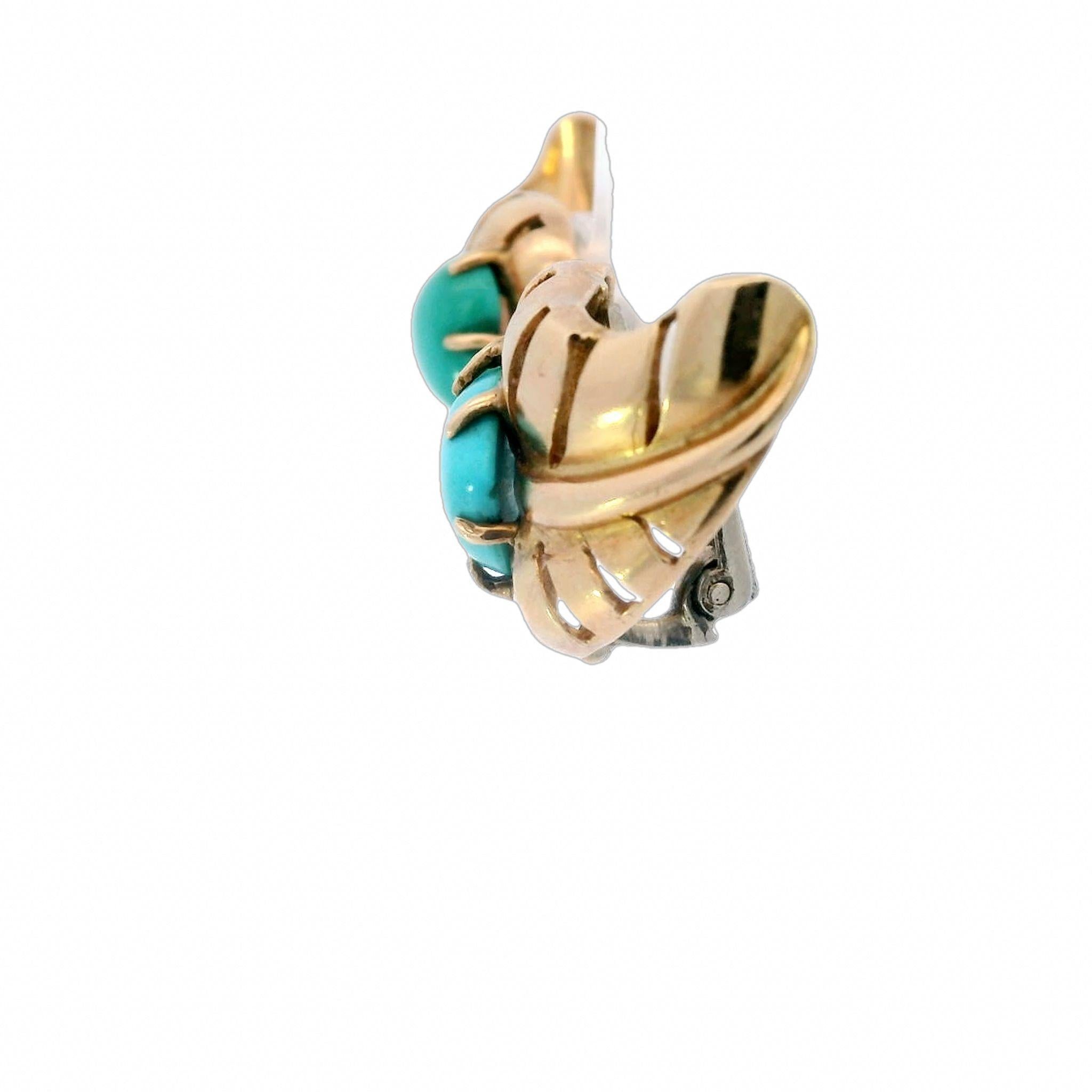 Seaman Schepps Heart Leaf Motif Clip On Earrings Turquoise Centers 14 Karat Gold

The Seaman Schepps Turquoise Heart and Leaf Earrings are a classic example of a naturalistic approach to jewelry. Made in 14-karat yellow gold, these earrings feature