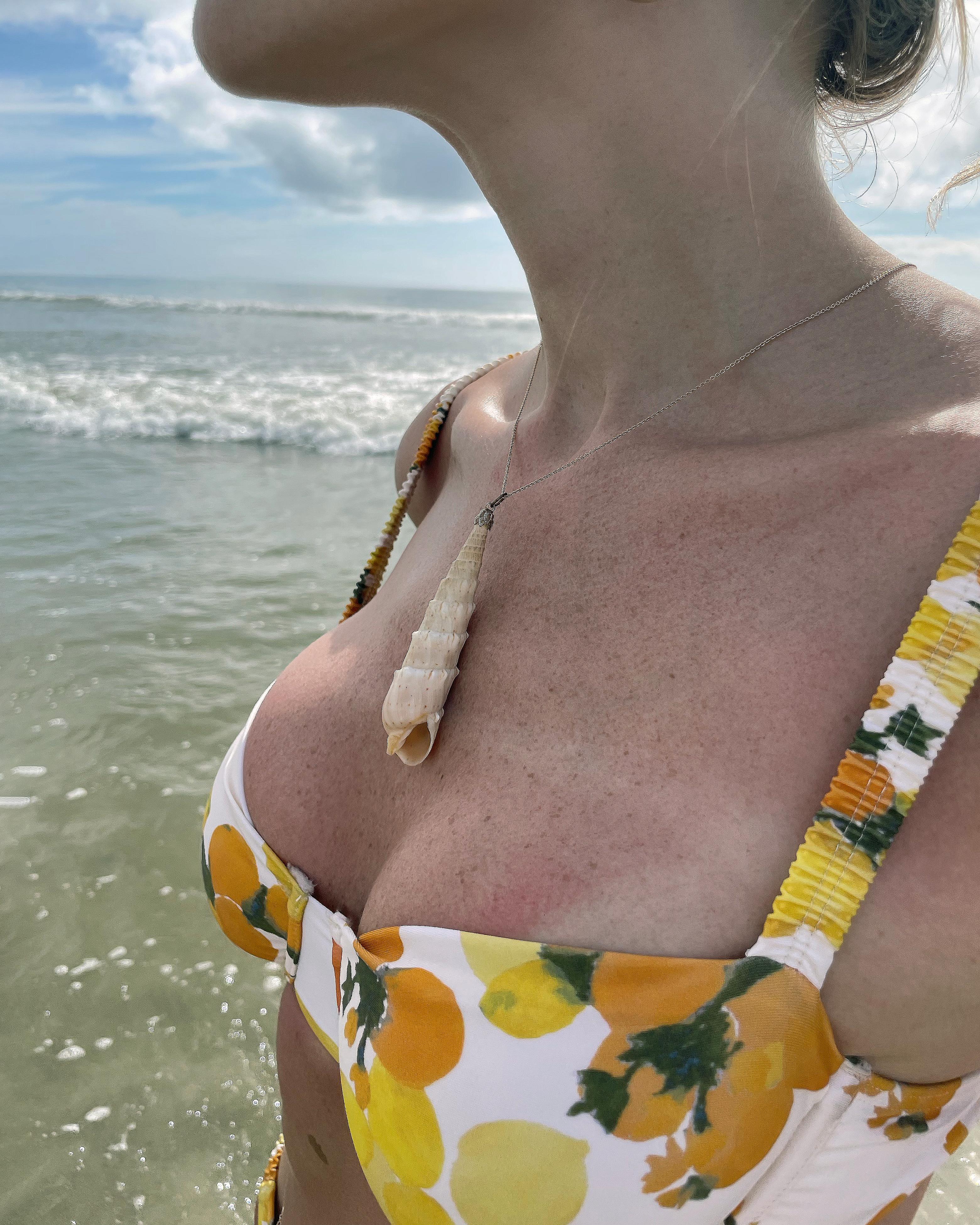 VERY BREEZY presents: This pendant is crafted from a genuine auger seashell, and mounted with a gold-toned metal bail. It was sourced in Italy, and I love to imagine the adventures it has been on. The shape is so unusual, spiraling to get wider