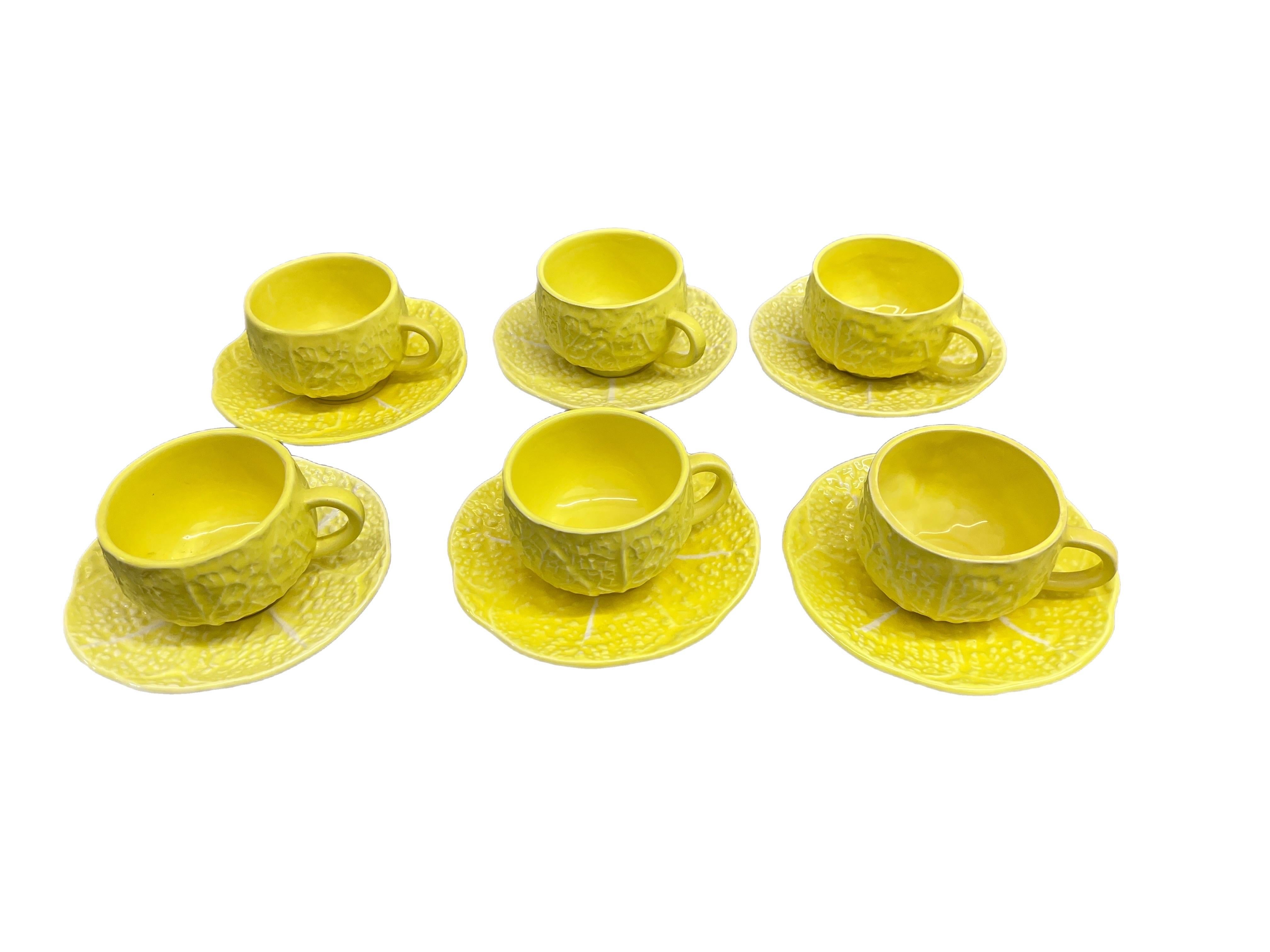 This set of 21 pieces of Secla yellow cabbage ware includes 6 cups with 6 saucers, 6 salad or dessert plates, and 3 soup cups. circa Mid-20th Century.
Dinner plates measure: 8.75” x .1”tall
Saucer plates measure: 6.25” x .1”
Cups measure : 5” x