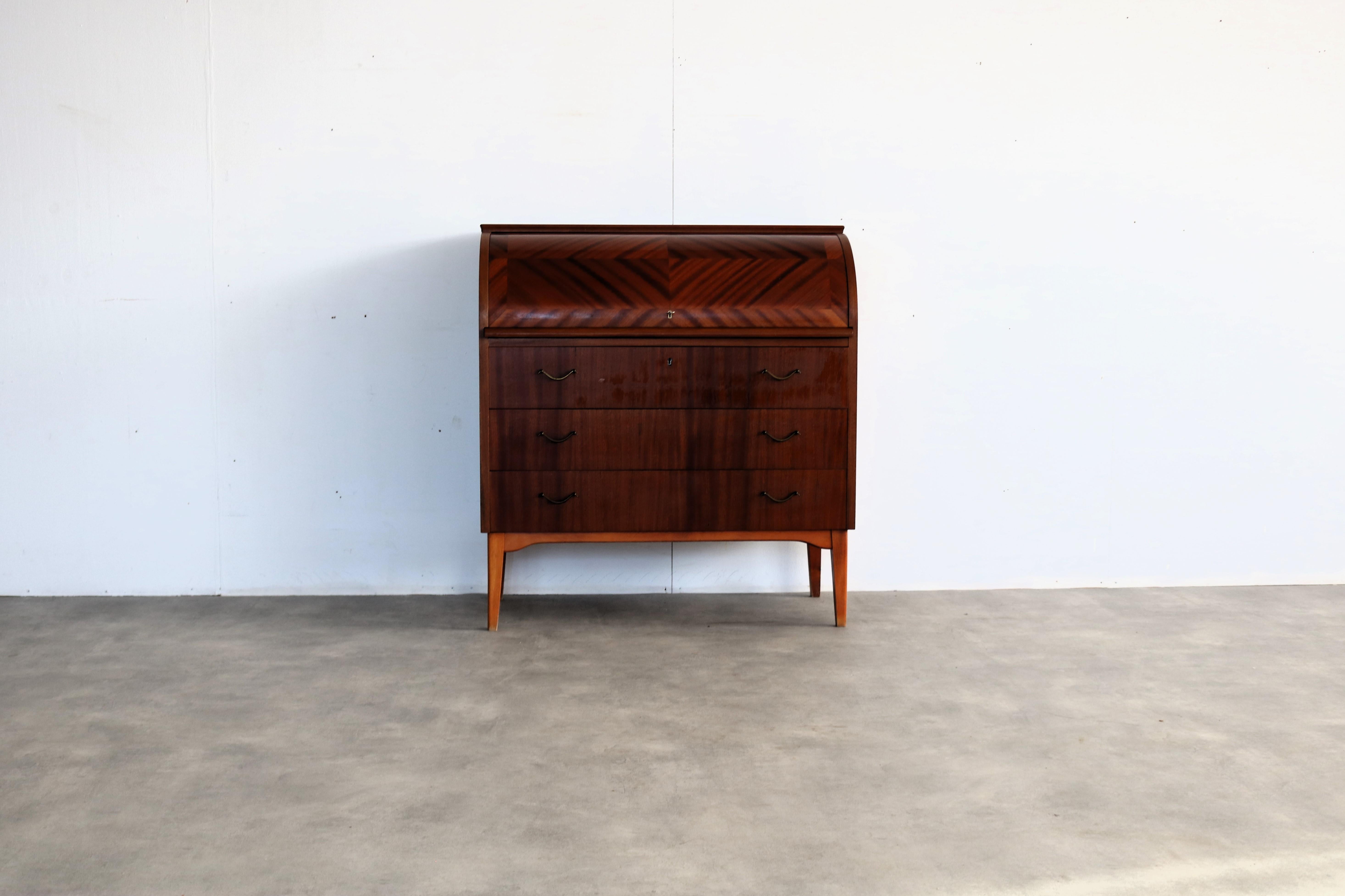 vintage secretary  Broderna  60s  Sweden

period  60's
design  Bröderna Gustafssons  Sweden
condition  good  light signs of use  
size  97 x 90 x 45 (hxwxd)

details  teak; copper;

article number  2646