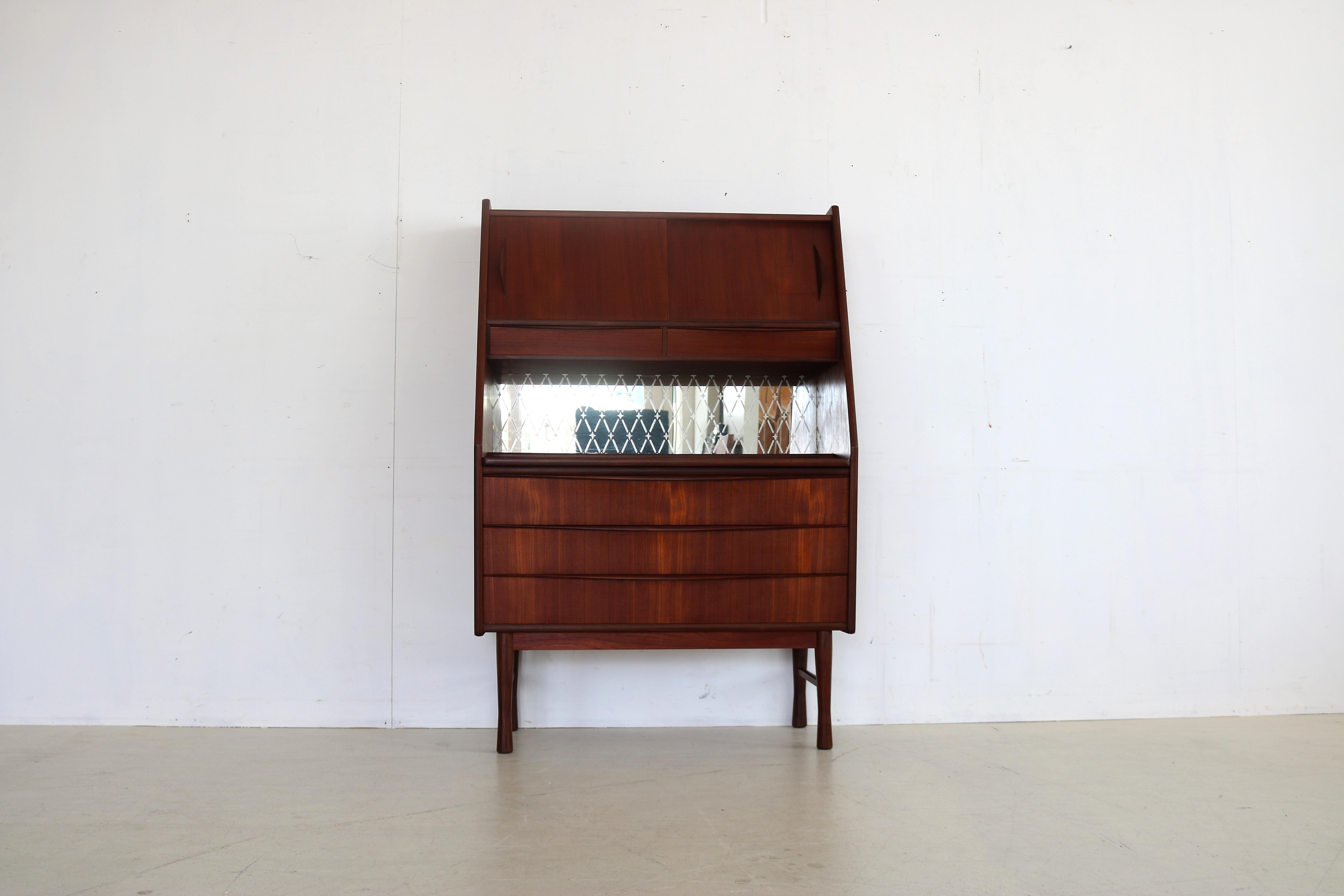 Vintage Secretary cabinet teak 1960s Danish

Period 1960s
Designs unknown, Denmark
Conditions excellent light signs of use
Size 139 x 93 x 45 (hxwxd)

Details teak; glass;

Article number 1666