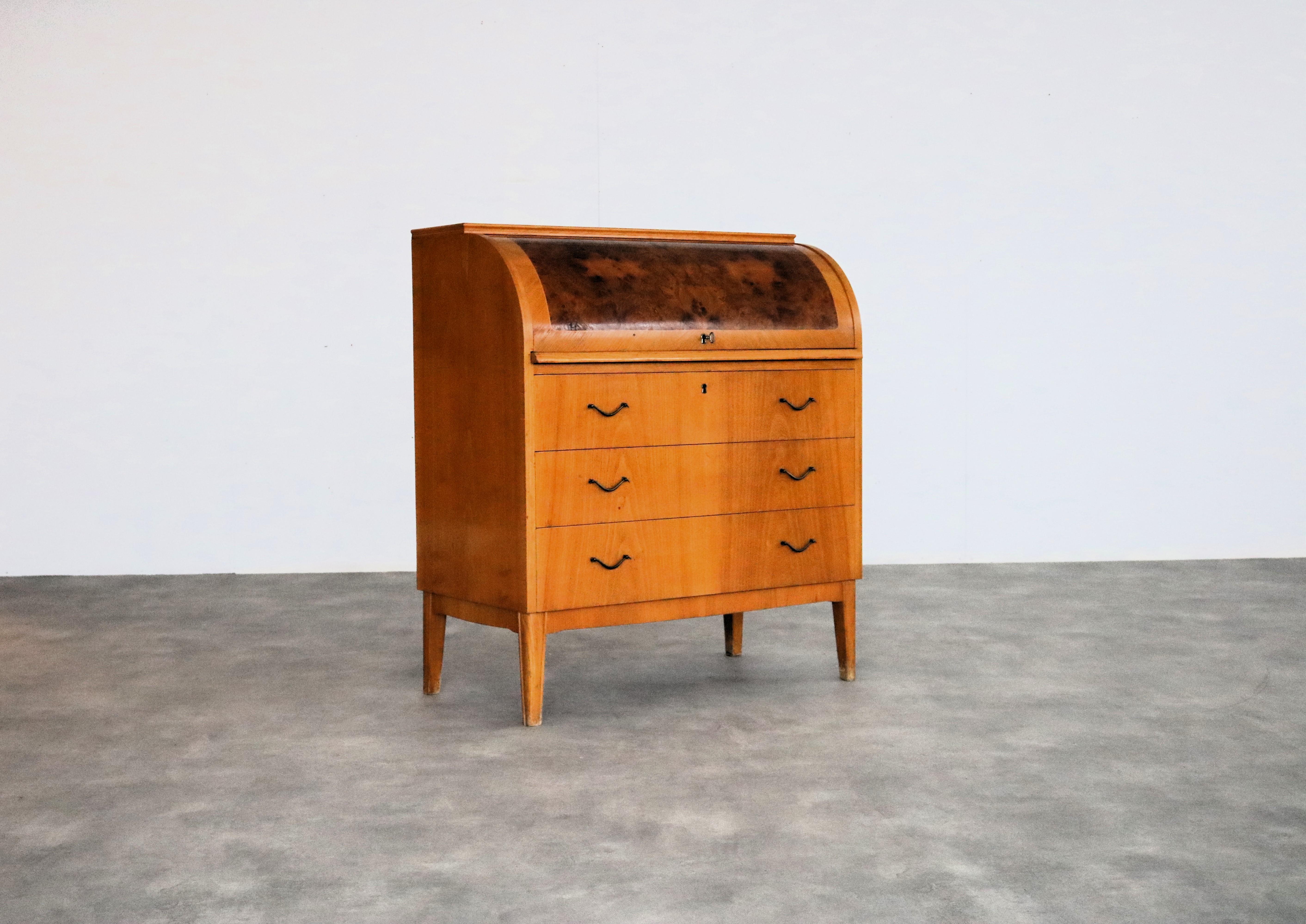 vintage secretary  cupboard  60s  Sweden

period  60's
design  unknown  Sweden
condition  good  light signs of use
size  97 x 85 x 46 (hxwxd)

details  wood; copper;

article number  2631