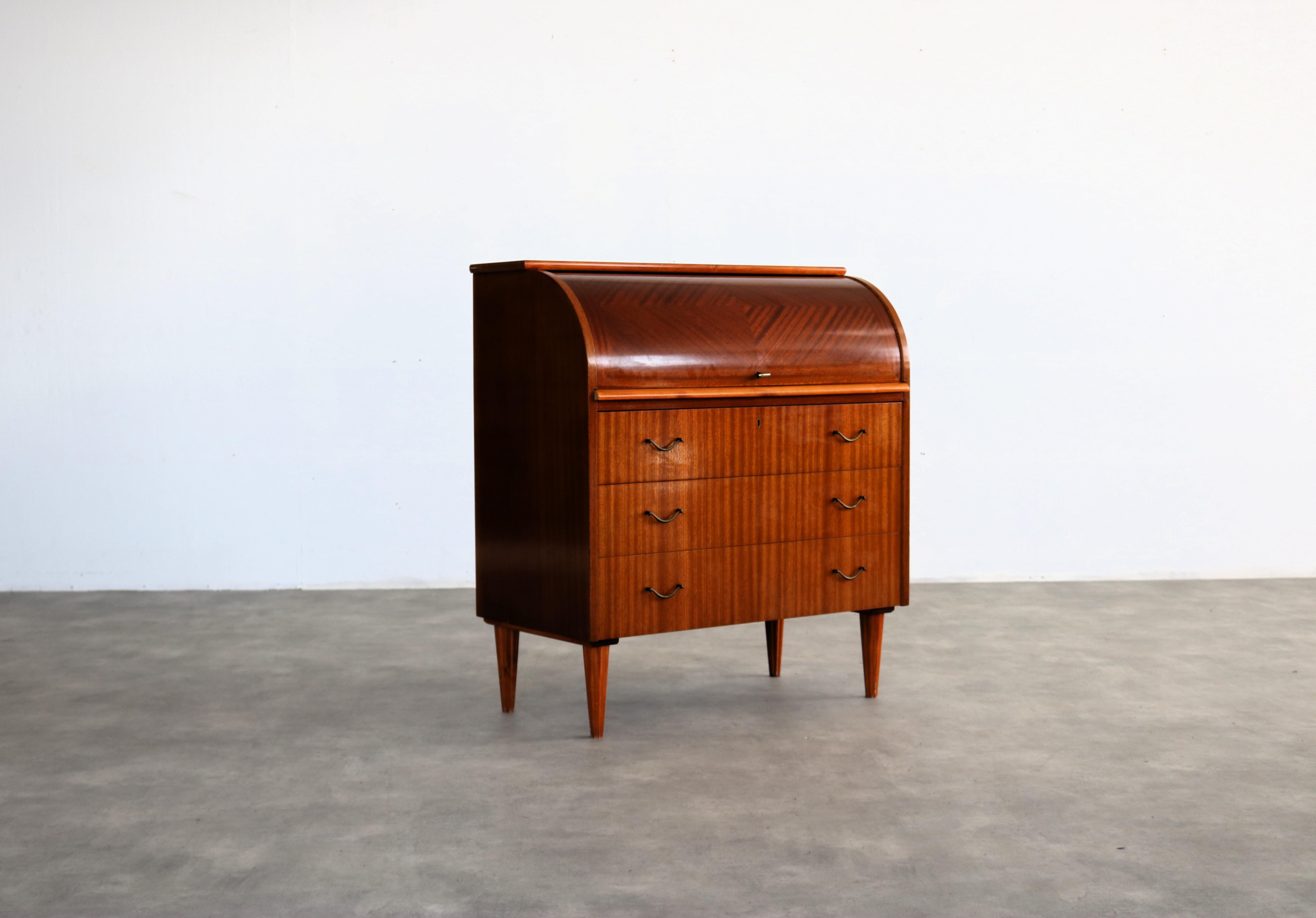 vintage secretary  desk  cabinet  1960s  Swedish

period  1960s
design  unknown  Sweden
condition  good  minor signs of use
size  96 x 86 x 45 (hxbxd)

details  teak; 

item number  2837