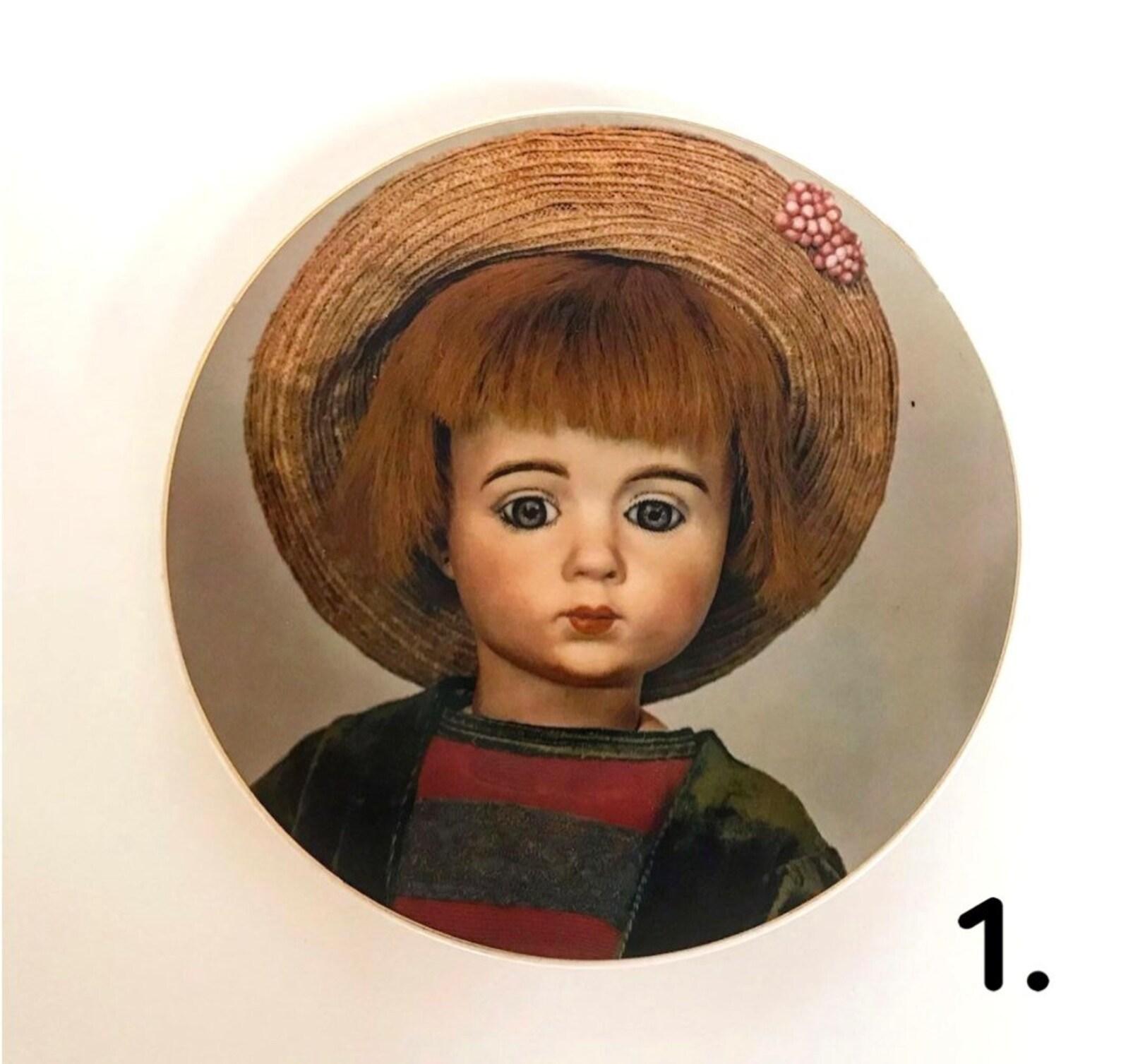 Decorative rare numbered collection plates from the “Old French Dolls” series.  

Porcelain, decal.  

USA, Seeley’s Ceramic Service inc.  1979, 1980

The dolls depicted on the plates were created in 1877-1891 in France.

 Each plate has a