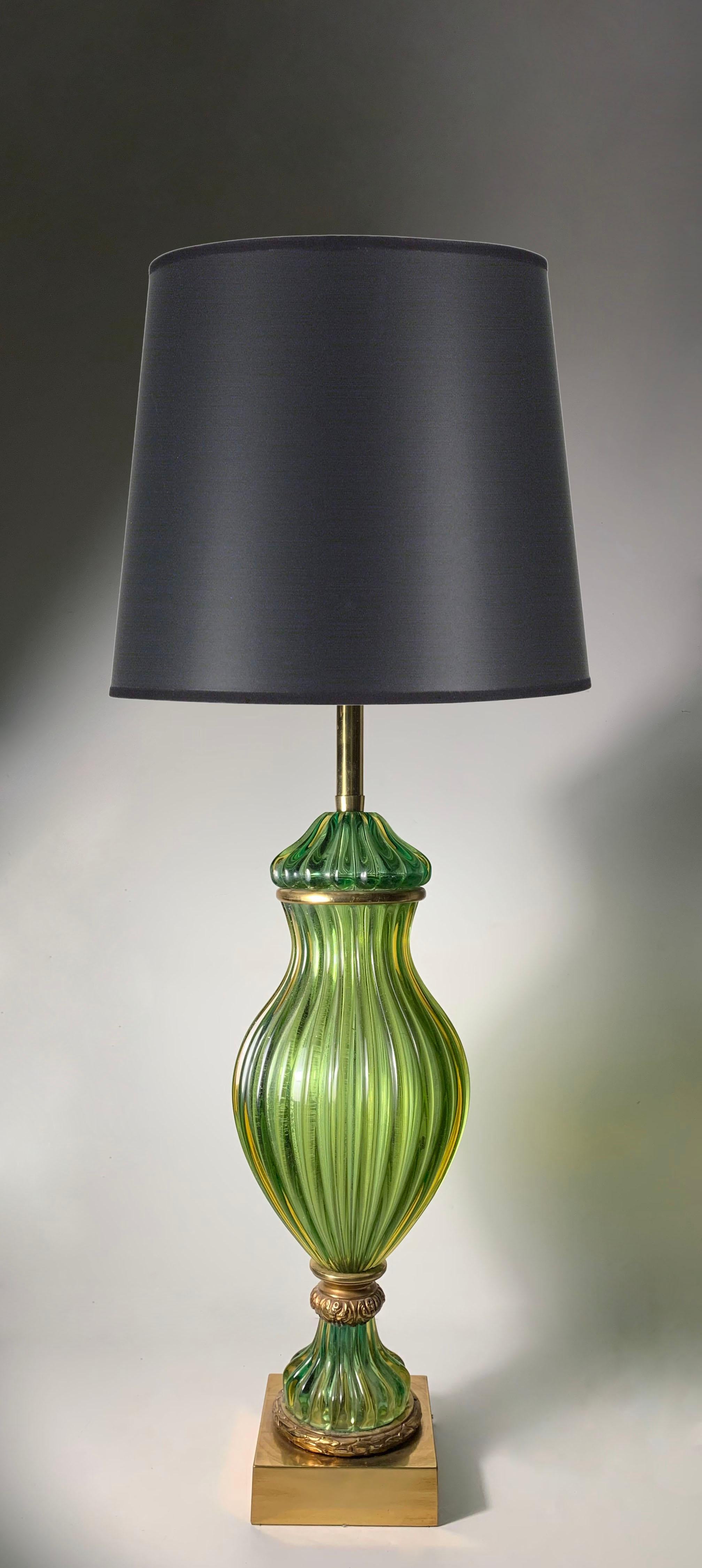 Vintage mid 20th century Seguso glass lamp for Marbro Lamp Company

Hollywood regency in style.