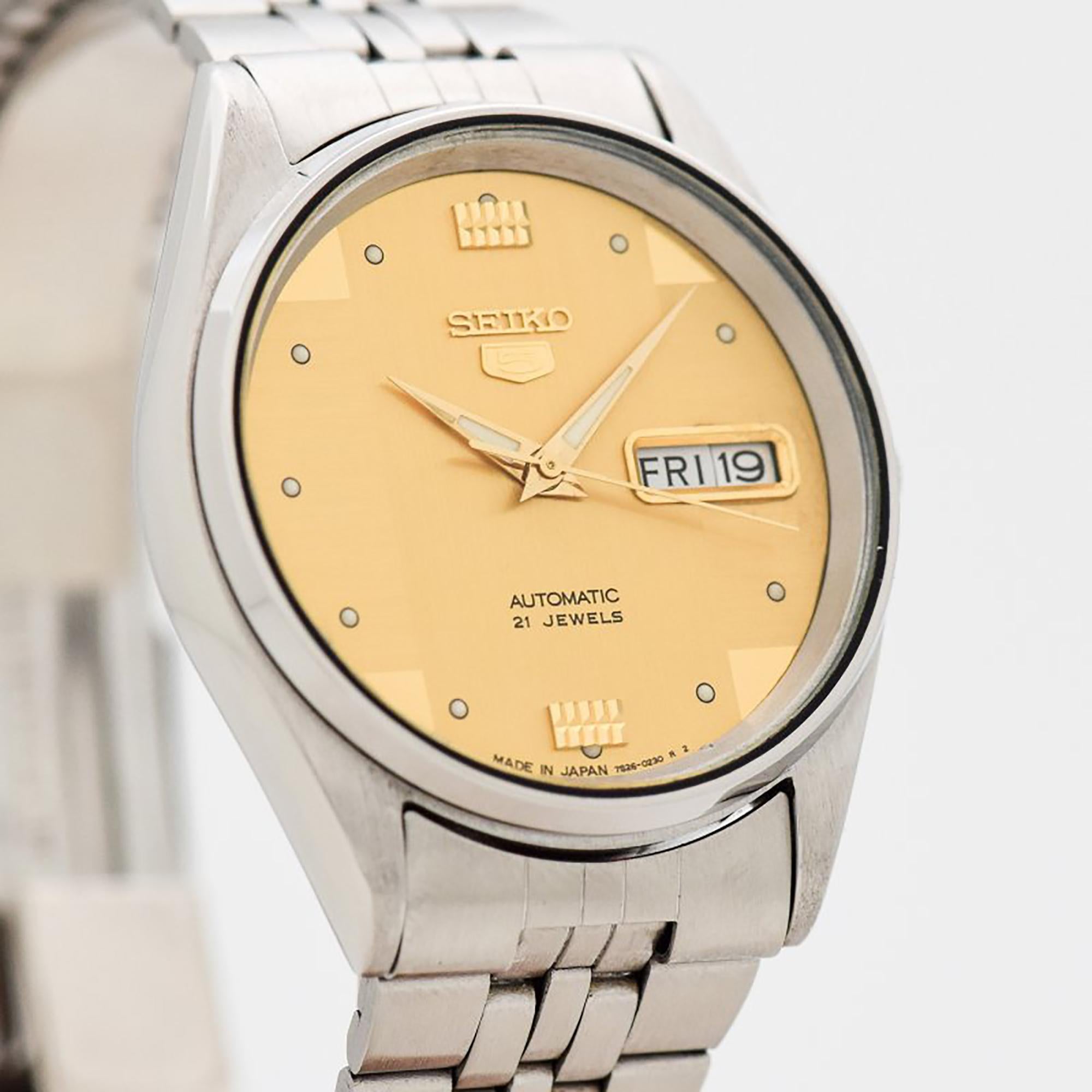 1982 Vintage Seiko 5 Automatic Ref. 6309-8906 Stainless Steel watch with Original Three Shades of Gold Dial with Original Seiko Stainless Steel Bracelet. 35mm x 42mm lug to lug (1.38 in. x 1.65 in.) - Powered by a 17-jewel, automatic caliber