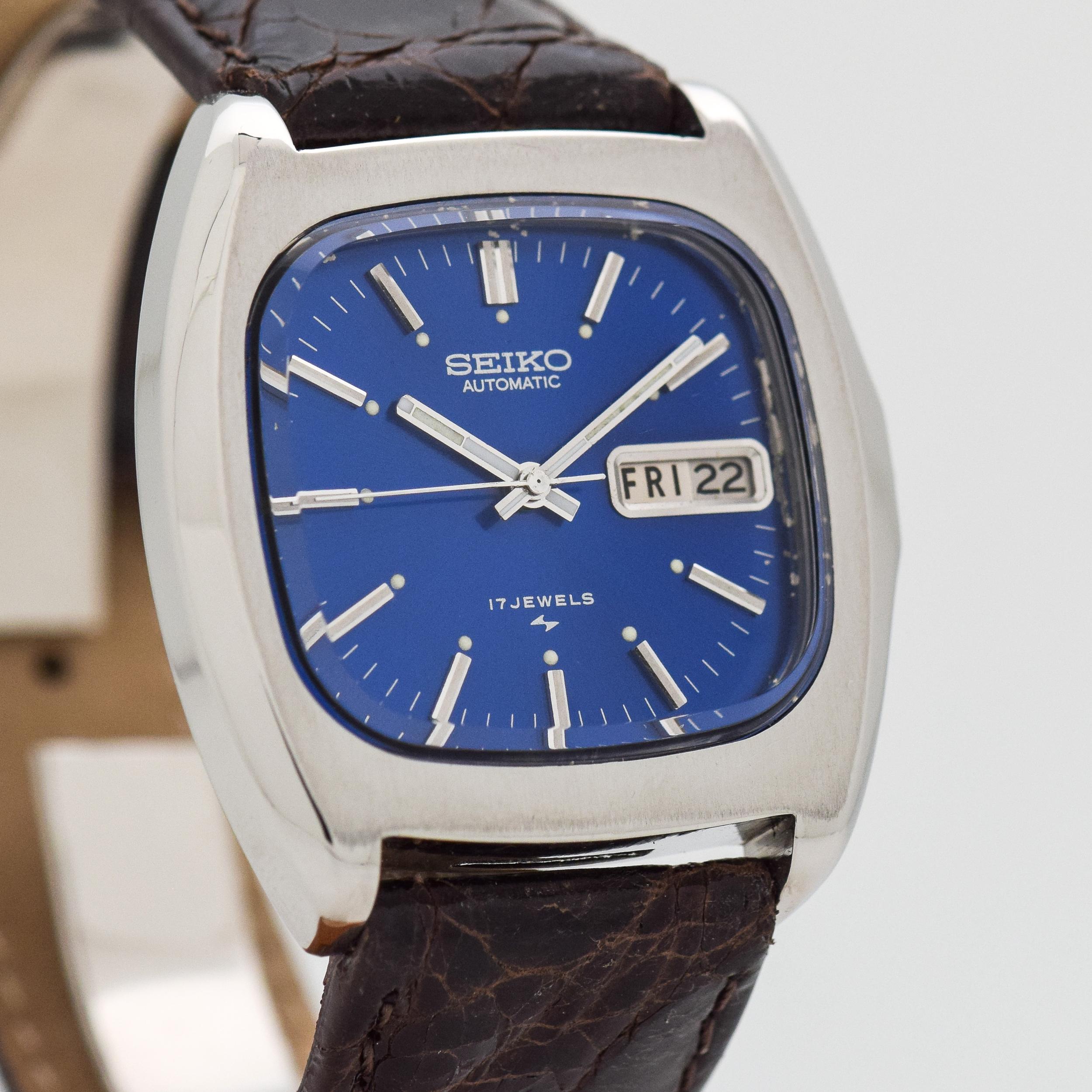 1972 Vintage Seiko Day - Date Ref. 7006-5019 Stainless Steel Watch with Original Blue Dial with Applied Steel Stick/Bar/Baton Markers. 38mm x 40mm lug to lug (1.5 in. x 1.57 in.) - 17 jewel, automatic caliber movement. Equipped with a 100% Genuine