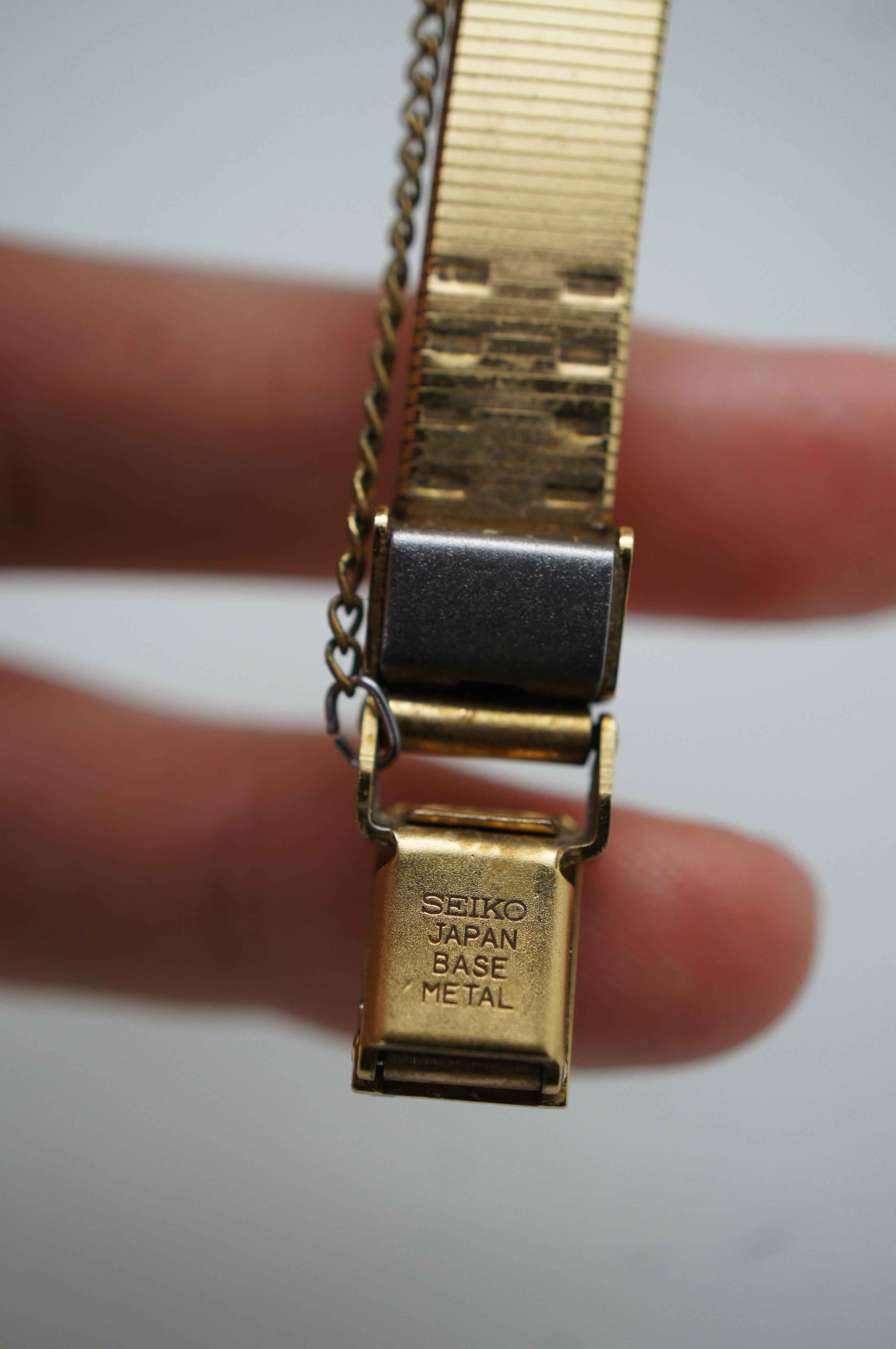 Vintage Seiko Quartz Gold Tone Retro Ladies Stretch Band Wrist Watch 971936 1