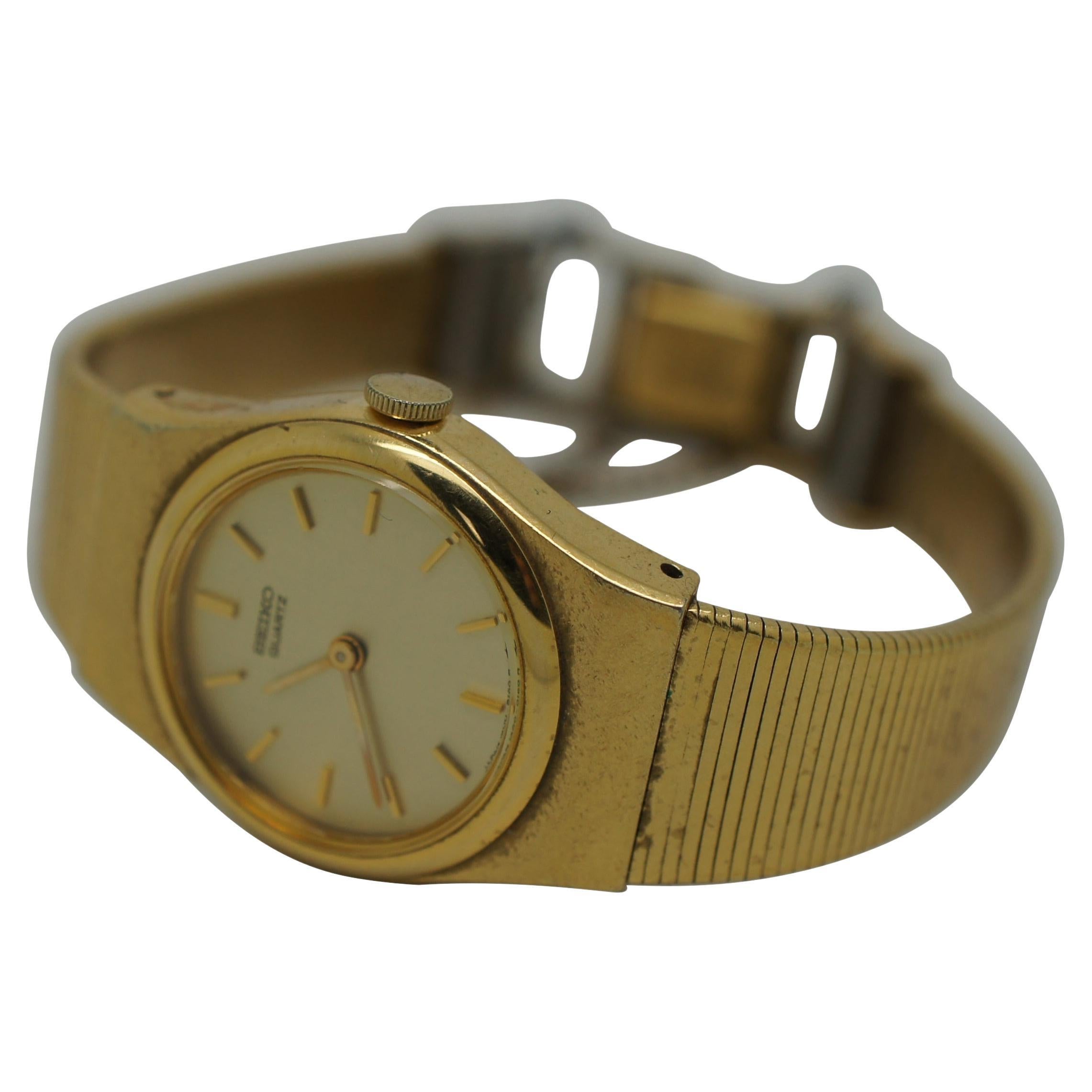 Vintage Seiko Quartz Gold Tone Retro Ladies Stretch Band Wrist Watch 971936