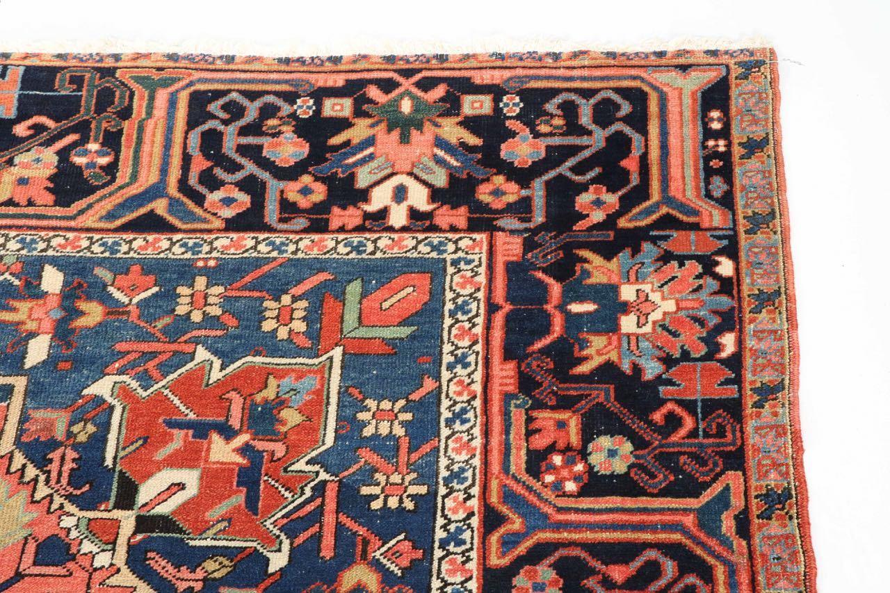 FINE AUTHENTIC SEMI-ANTIQUE PERSIAN HERIZ
Circa 1920-30
Item # C104005 

This gorgeous rug remains in excellent condition, its bold palette mellowed from years of gentle use and sun exposure to result in a most interesting burnt red ground. The