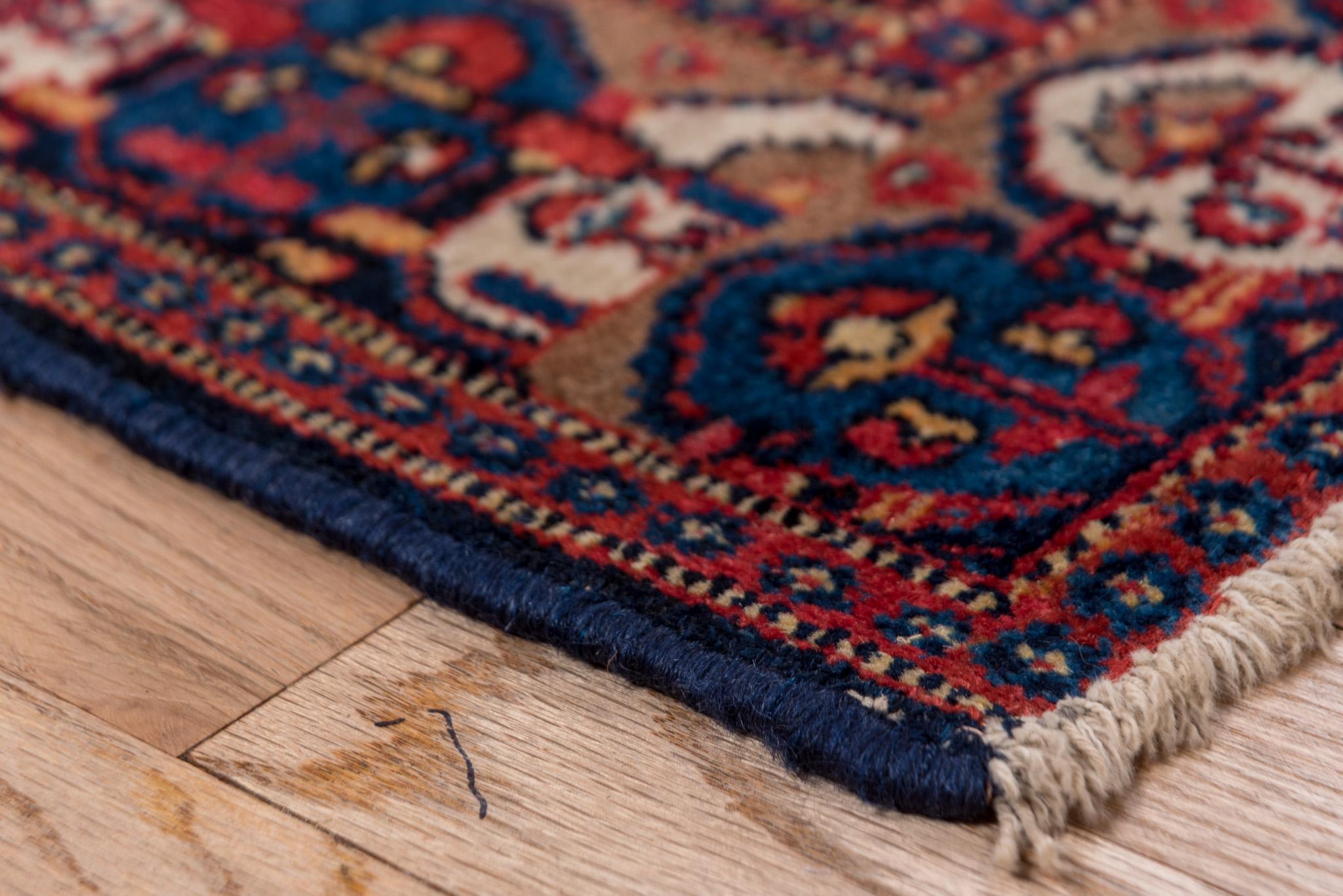 This is a stunning Senne rug measuring 3.6 x 4.8 feet. It features a vibrant central medallion surrounded by intricate floral and geometric motifs in rich shades of red, navy, and ivory. The fine handwoven craftsmanship and detailed border design