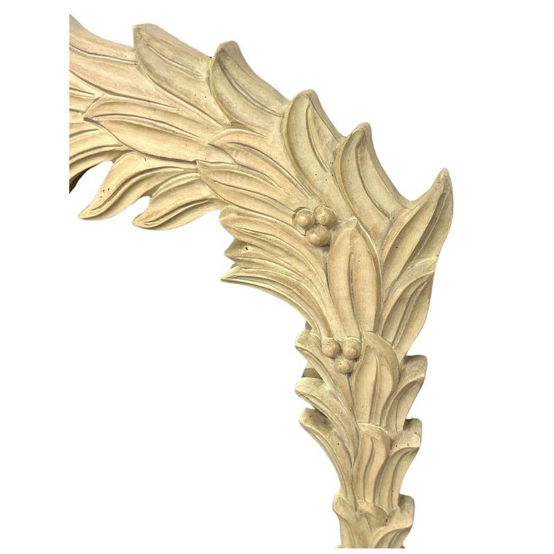 A vintage Serge Roche style wall mirror that epitomizes glamour and sophistication. The gesso frame, meticulously sculpted by skilled artisans, radiates a sense of opulence and grandeur, reminiscent of Roche's penchant for theatrical and luxurious