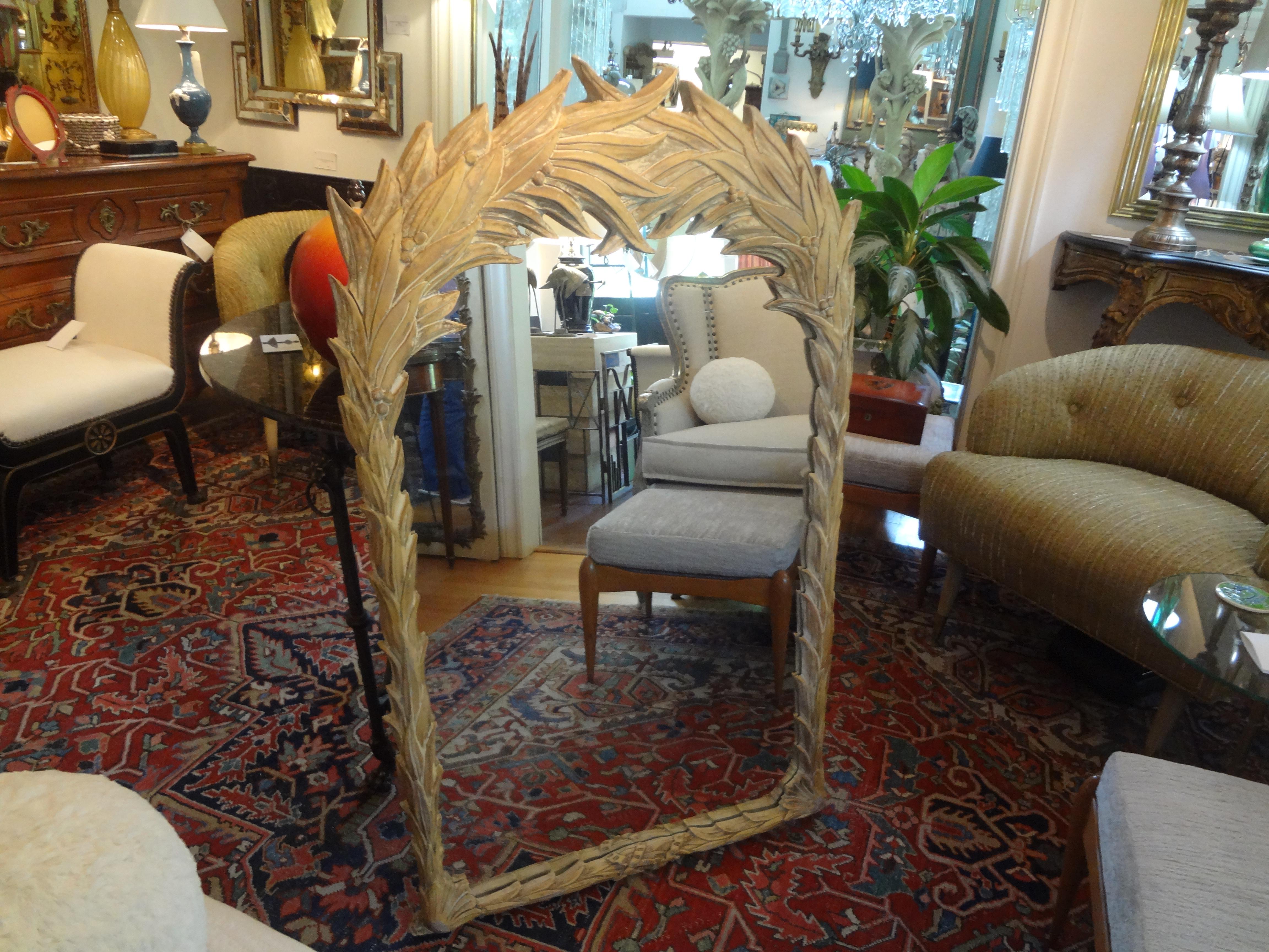 Great midcentury Serge Roche style palm frond mirror. This beautiful Hollywood Regency tropical Palm Beach style mirror is currently in its original Cerused finish but could be lacquered to your specifications.