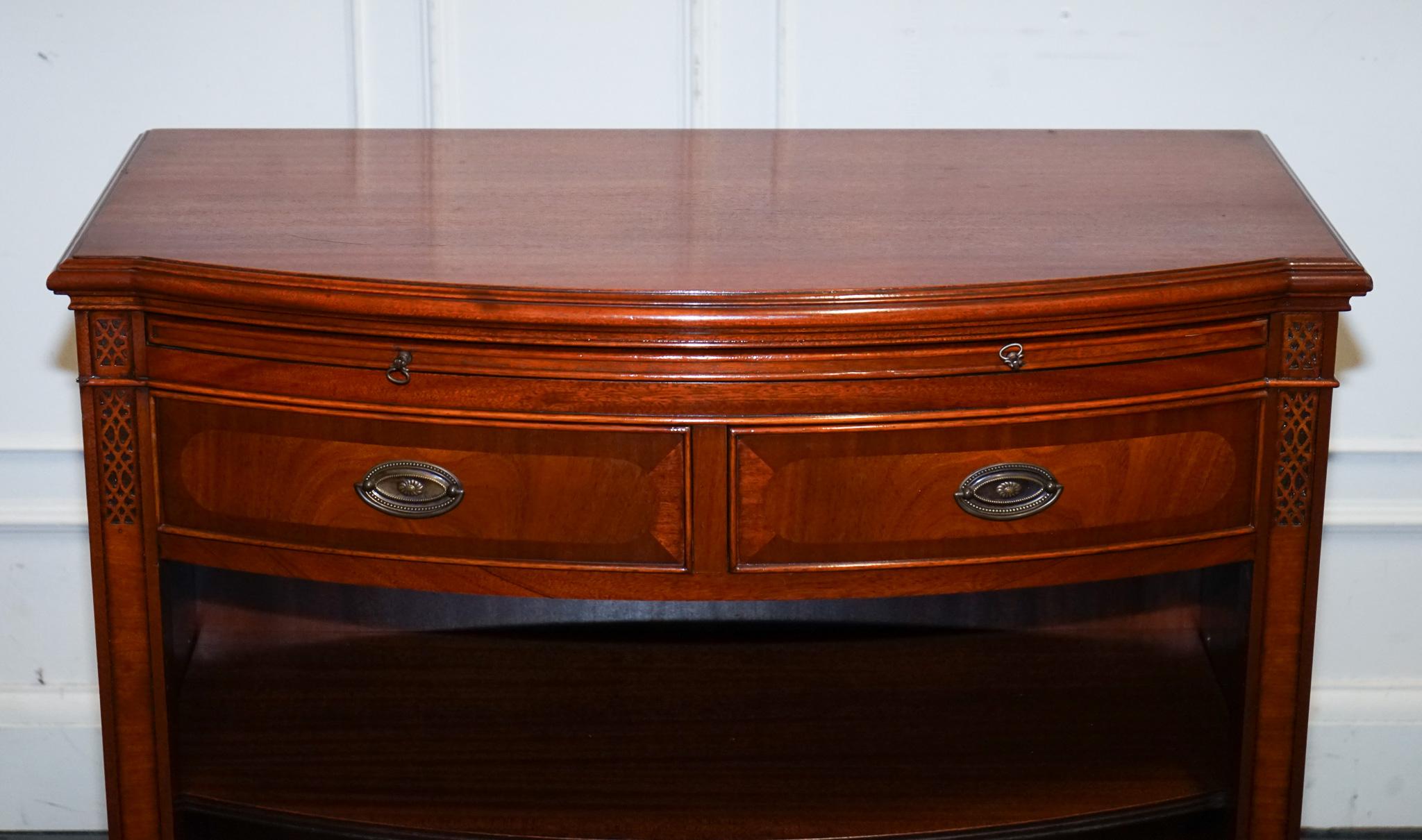 20th Century VINTAGE SERPENTINE BOW FRONT DWARF OPEN BOOKCASE WiTH TWO DRAWERS BY WADE For Sale