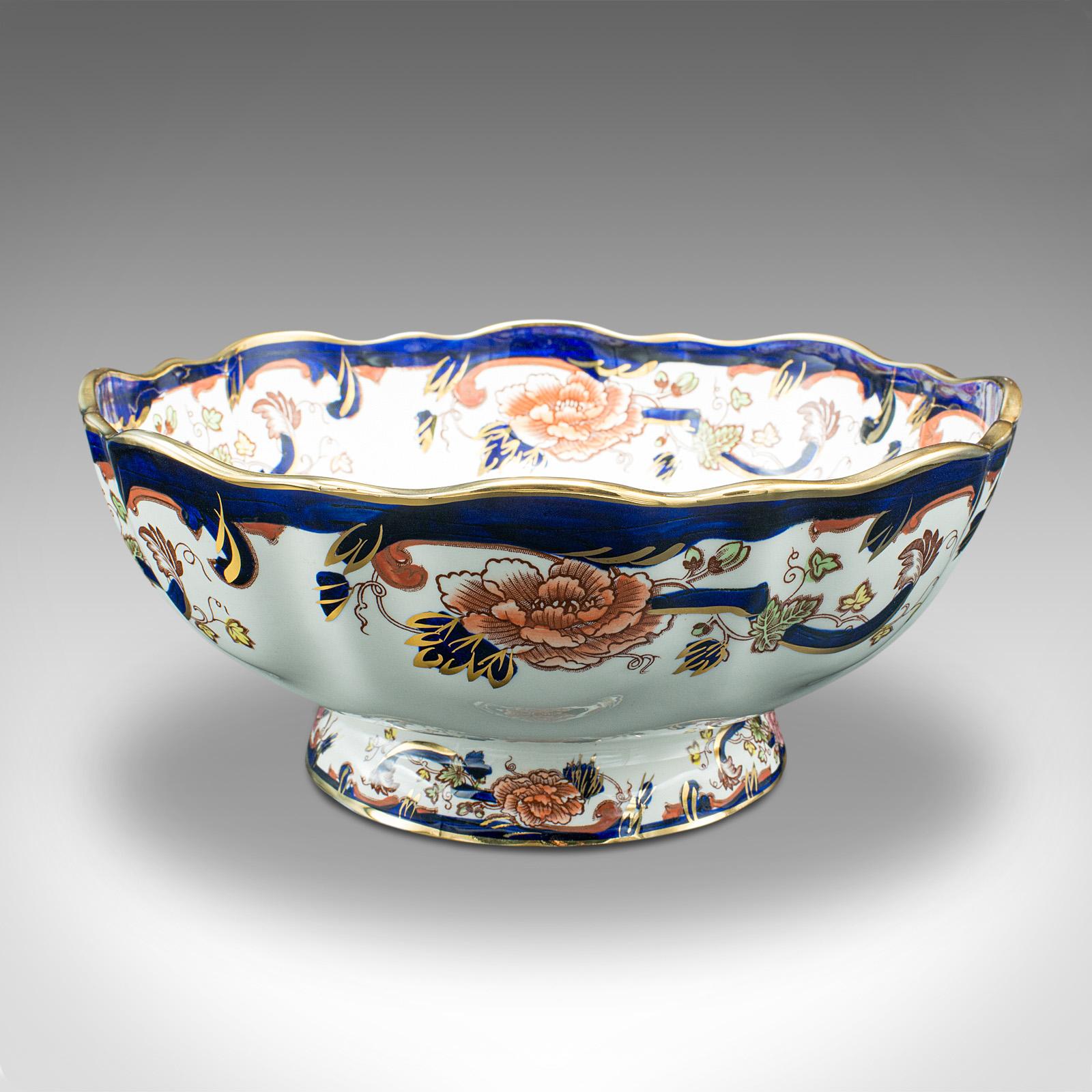 This is a vintage serving bowl. An English, ceramic decorative fruit dish, dating to the late 20th century, circa 1970.

Pleasingly eye-catching bowl, ideal for serving or presenting fruit on the table
Displays a desirable aged patina and in good